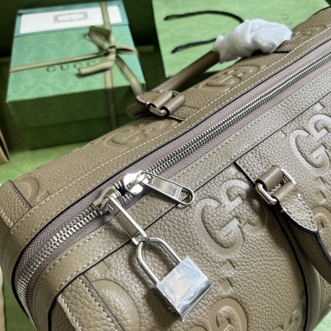 G*u*i gg duffle bag