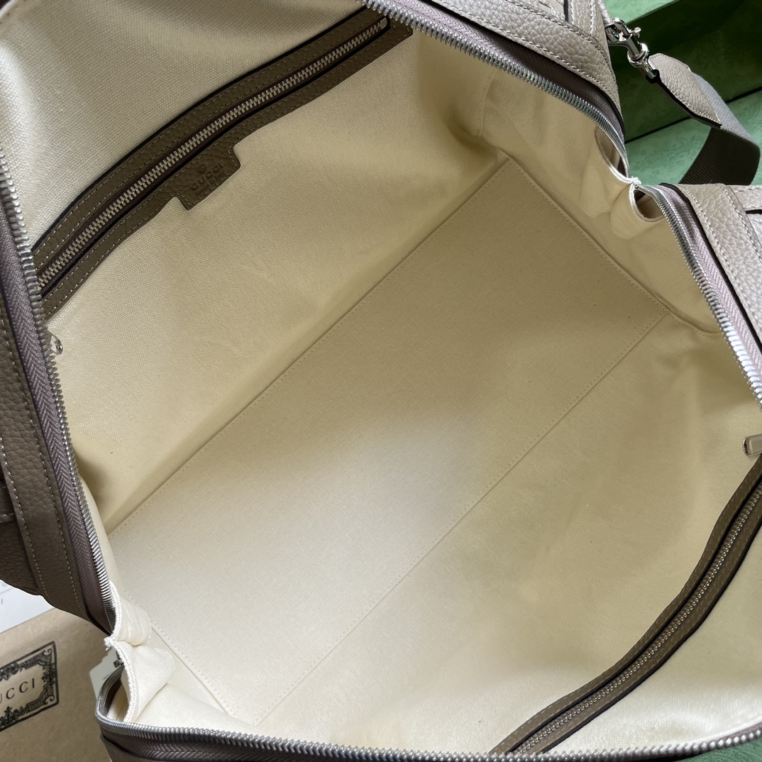 G*u*i gg duffle bag