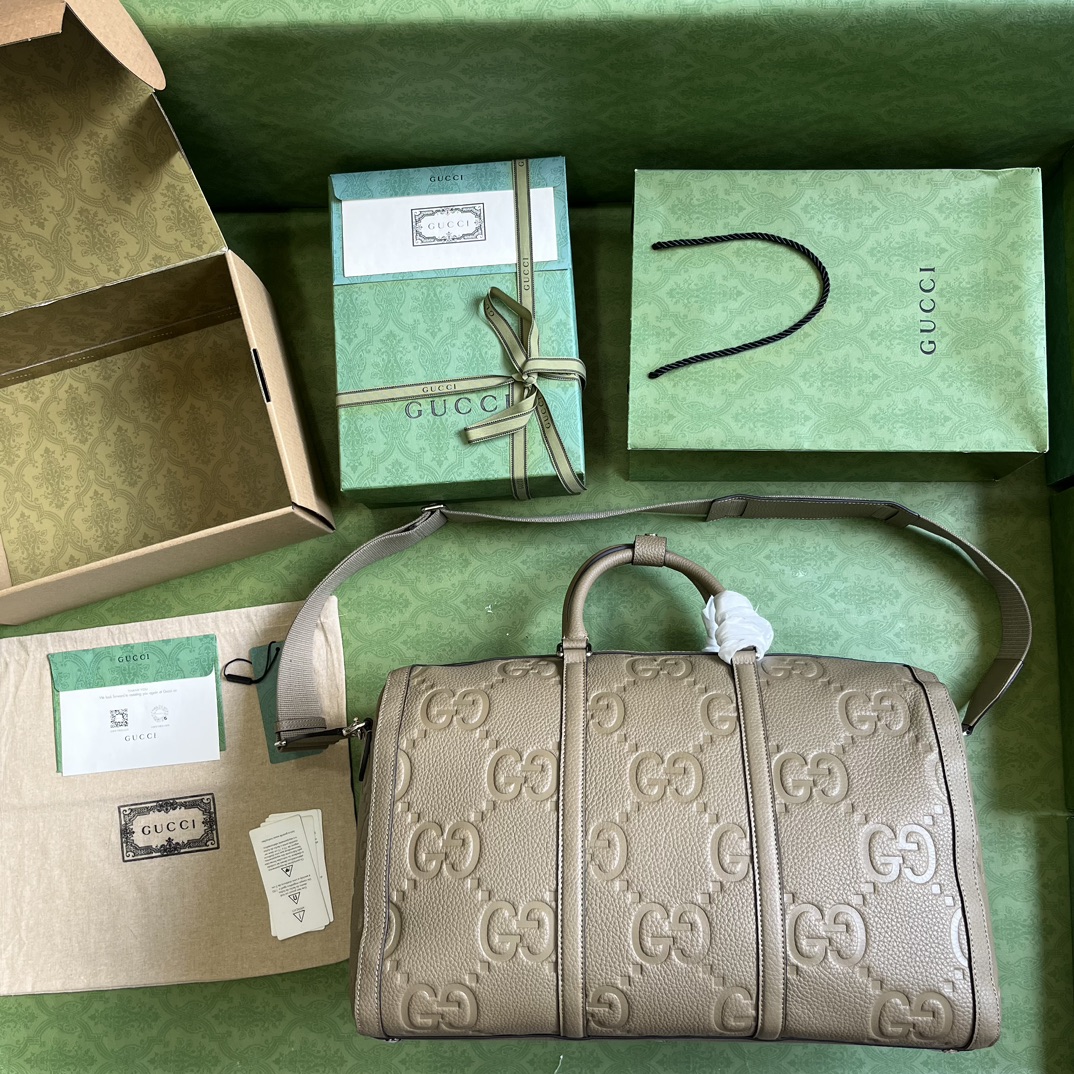 G*u*i gg duffle bag