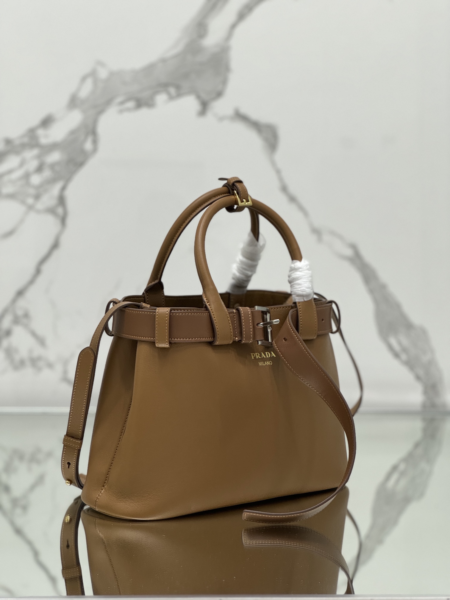 Pra*a buckle medium leather handbag with belt