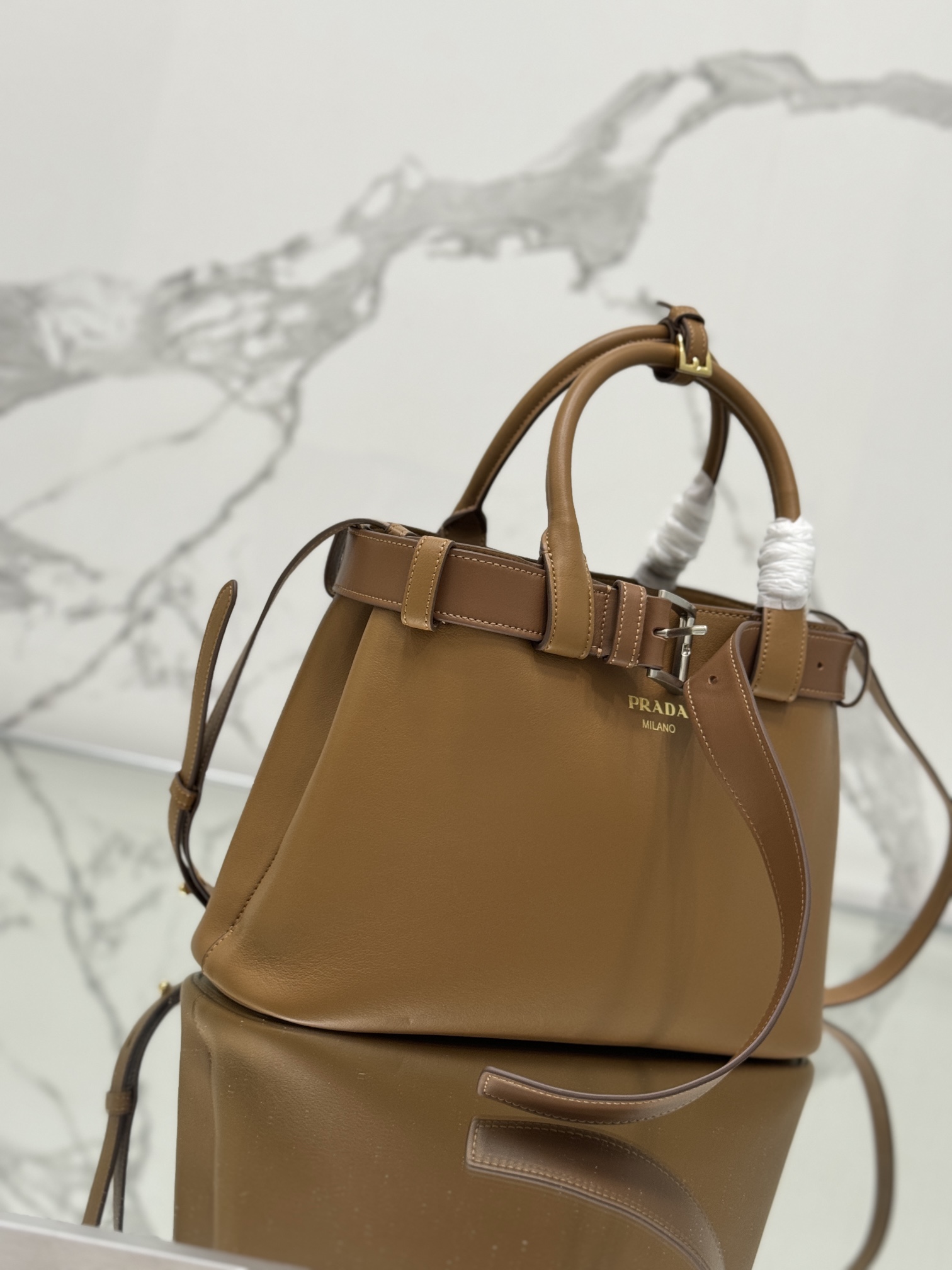 Pra*a buckle medium leather handbag with belt