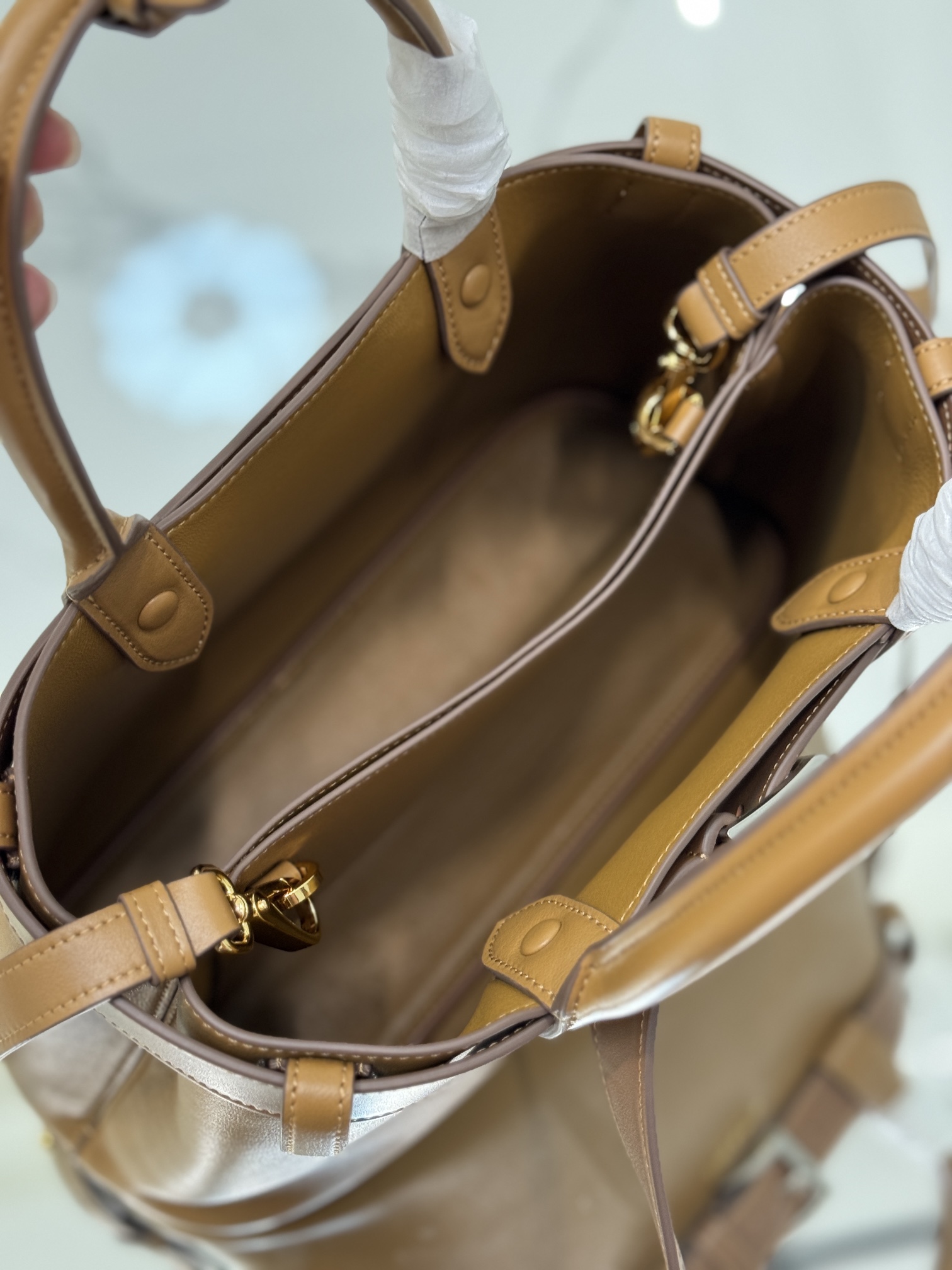 Pra*a buckle medium leather handbag with belt