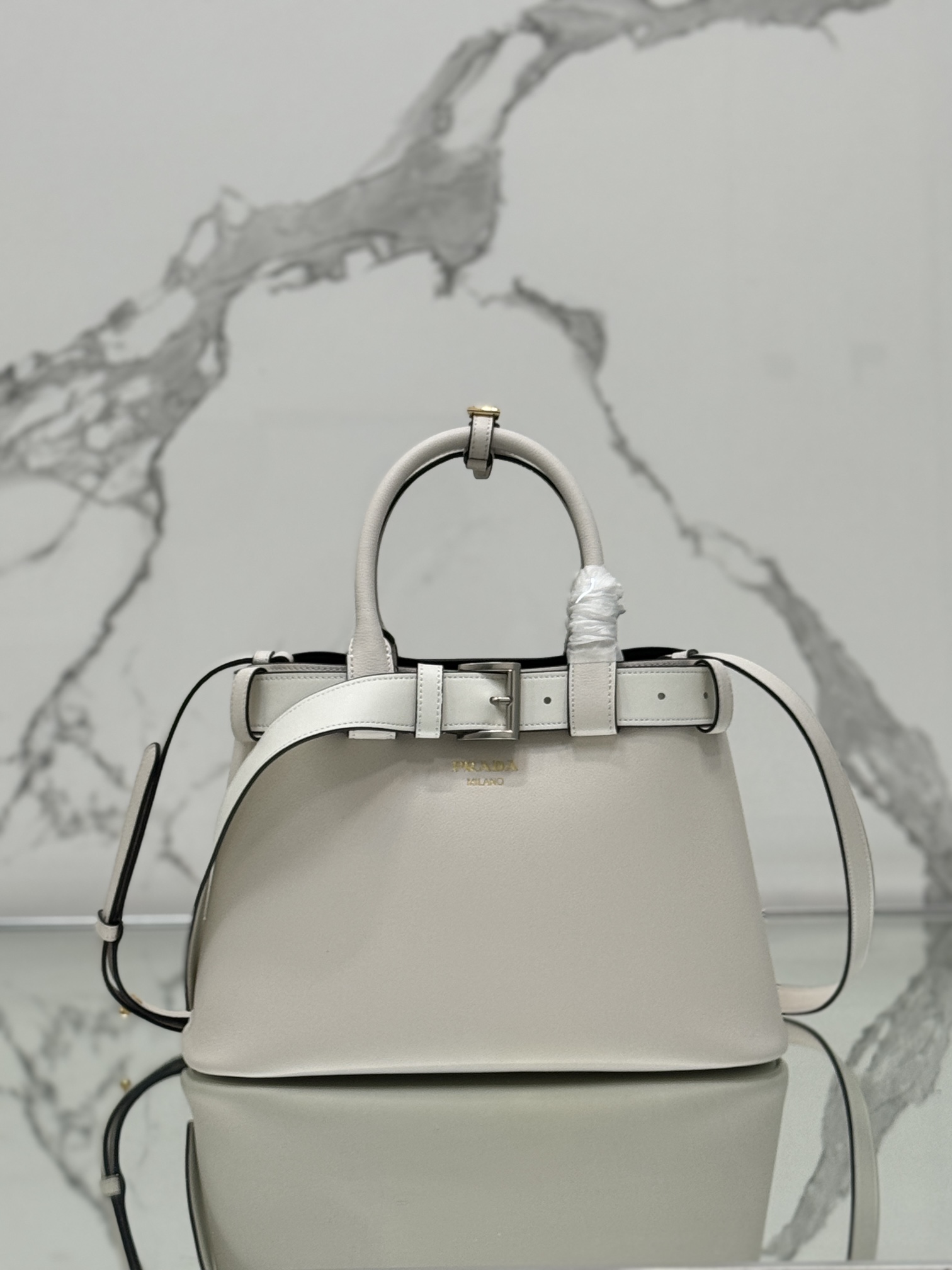 Pra*a buckle medium leather handbag with belt