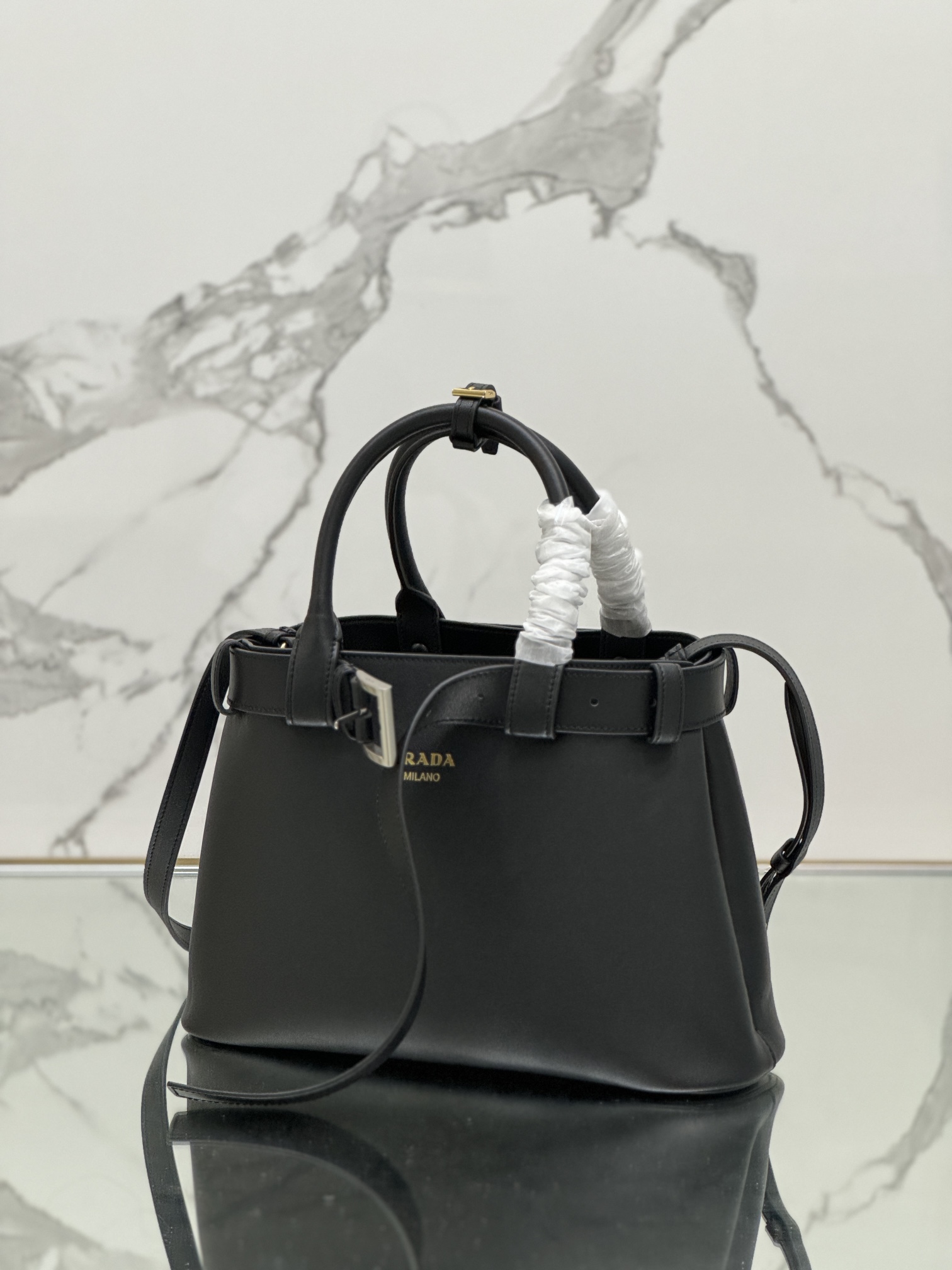 Pra*a buckle medium leather handbag with belt