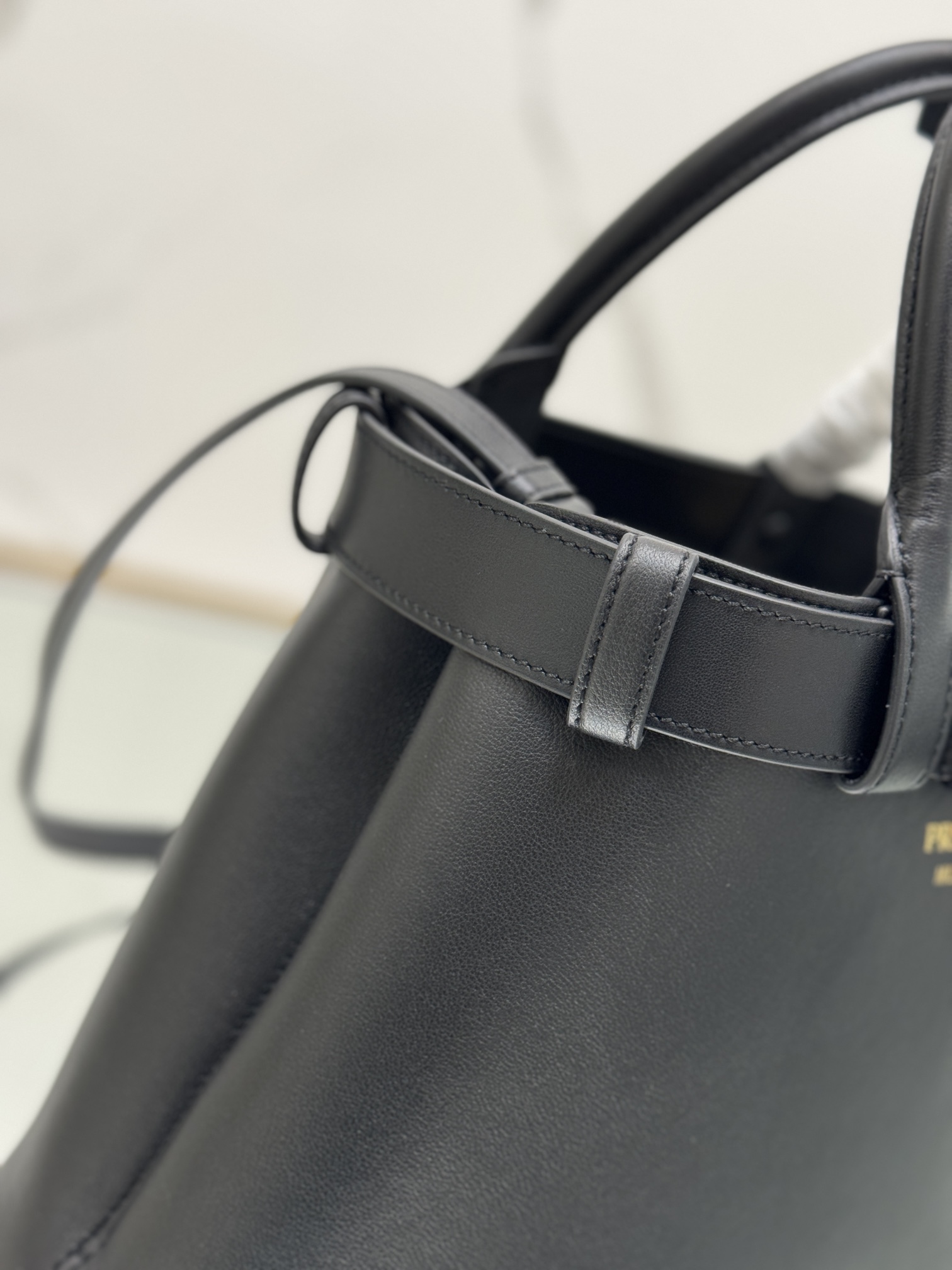 Pra*a buckle medium leather handbag with belt