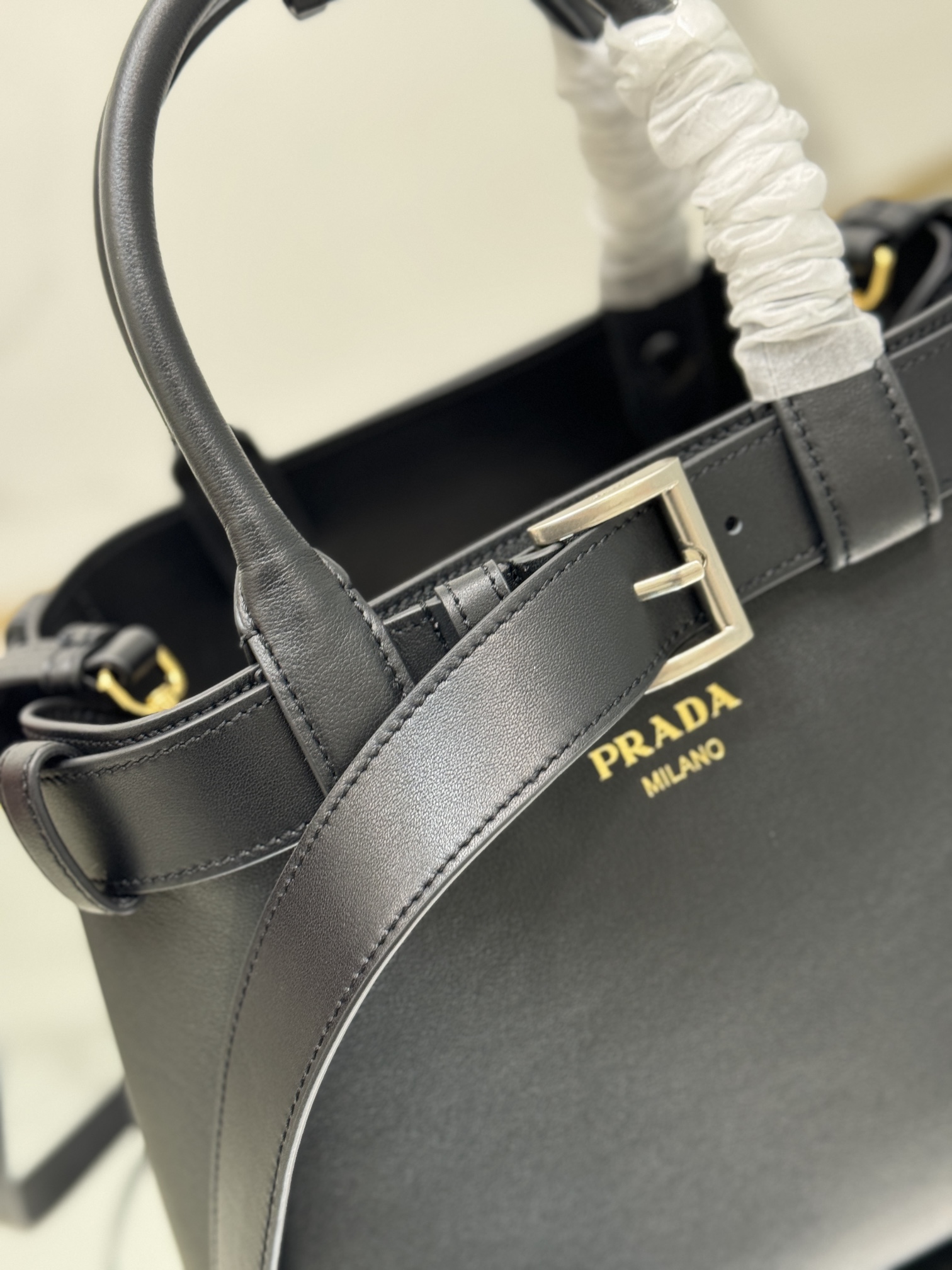 Pra*a buckle medium leather handbag with belt