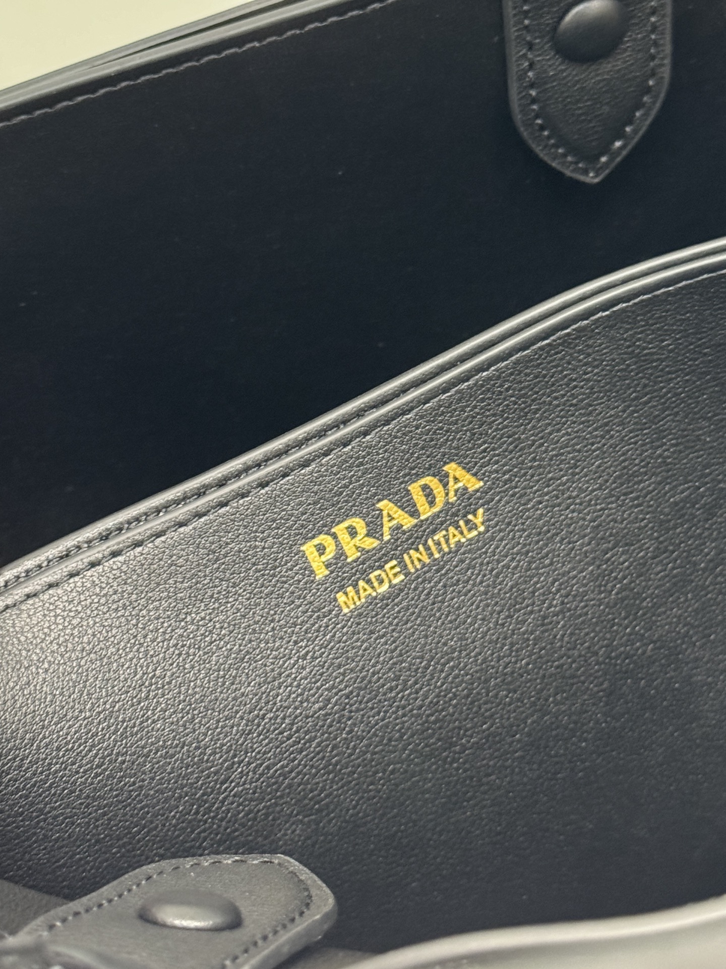 Pra*a buckle medium leather handbag with belt
