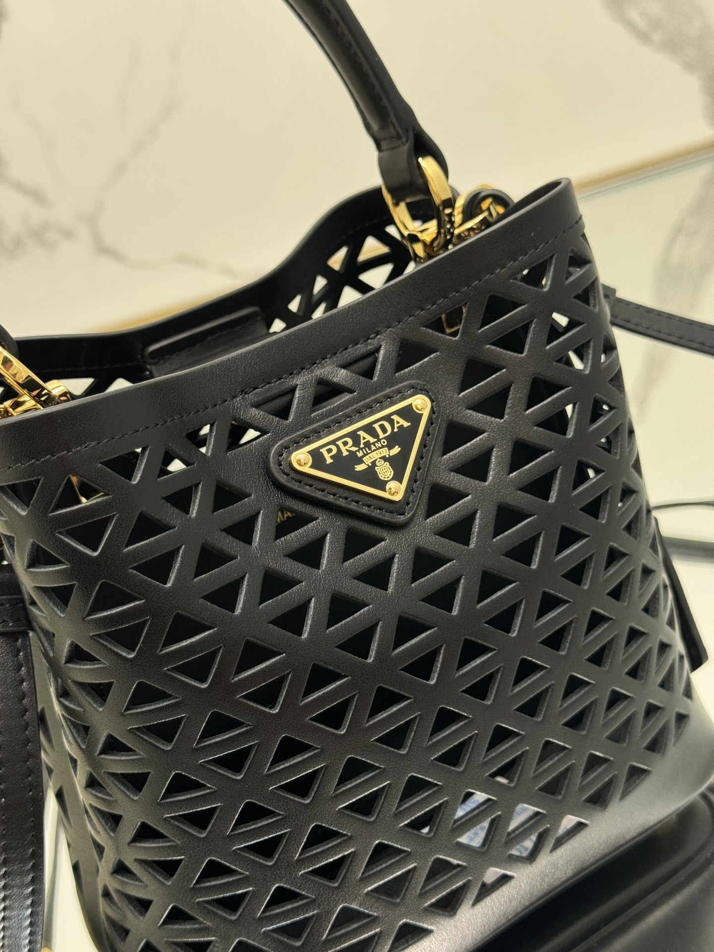 Pra*a small saffiano leather bag