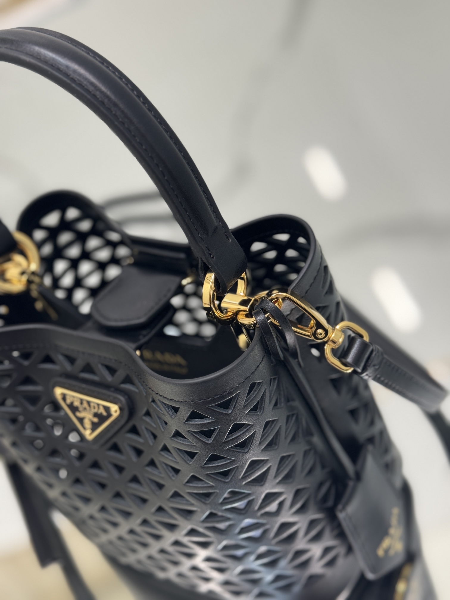 Pra*a small saffiano leather bag