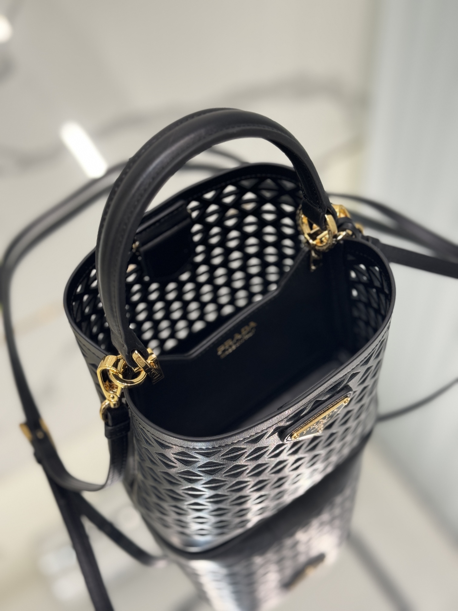 Pra*a small saffiano leather bag