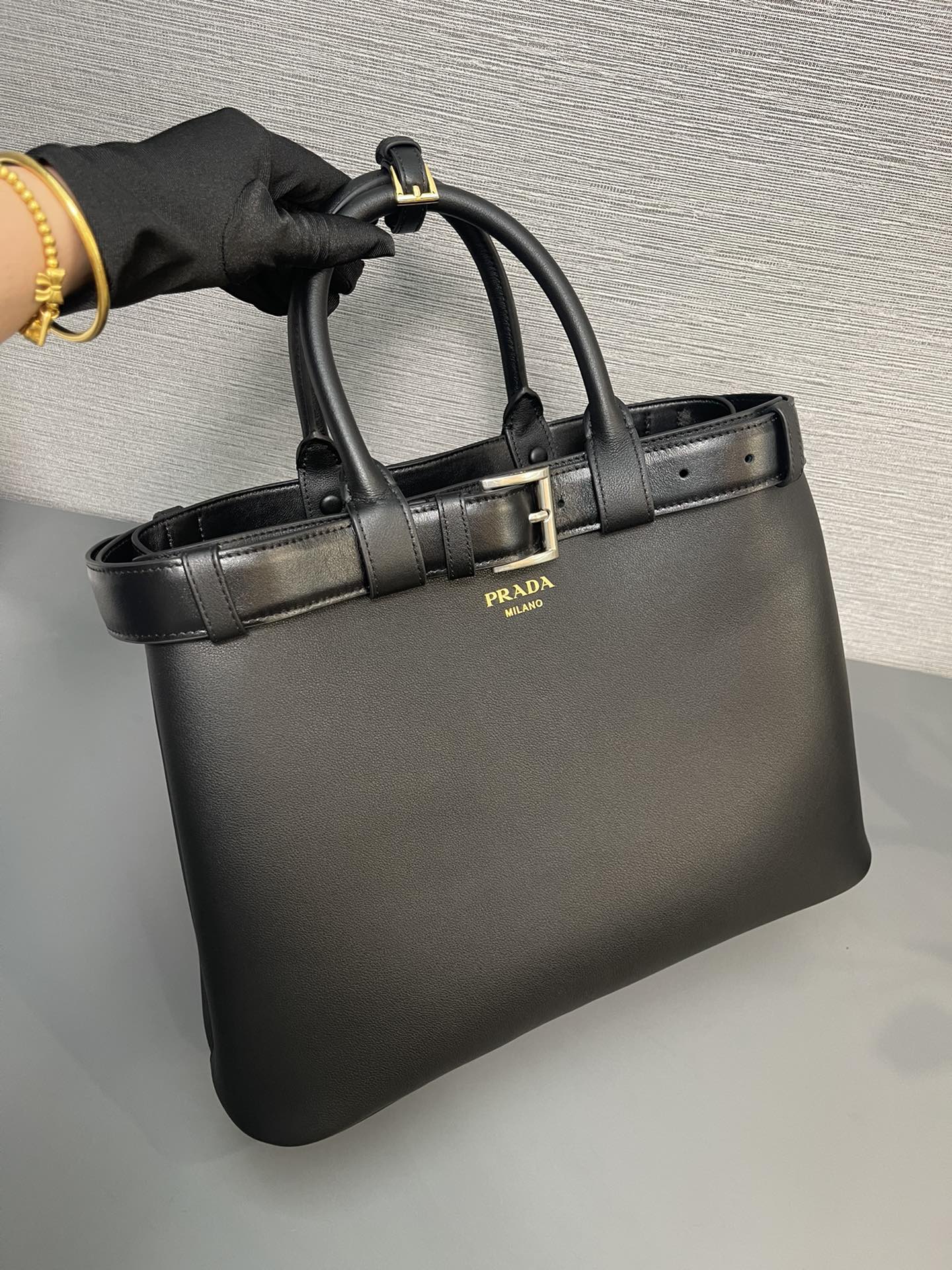 Pra*a buckle large leather handbag with belt