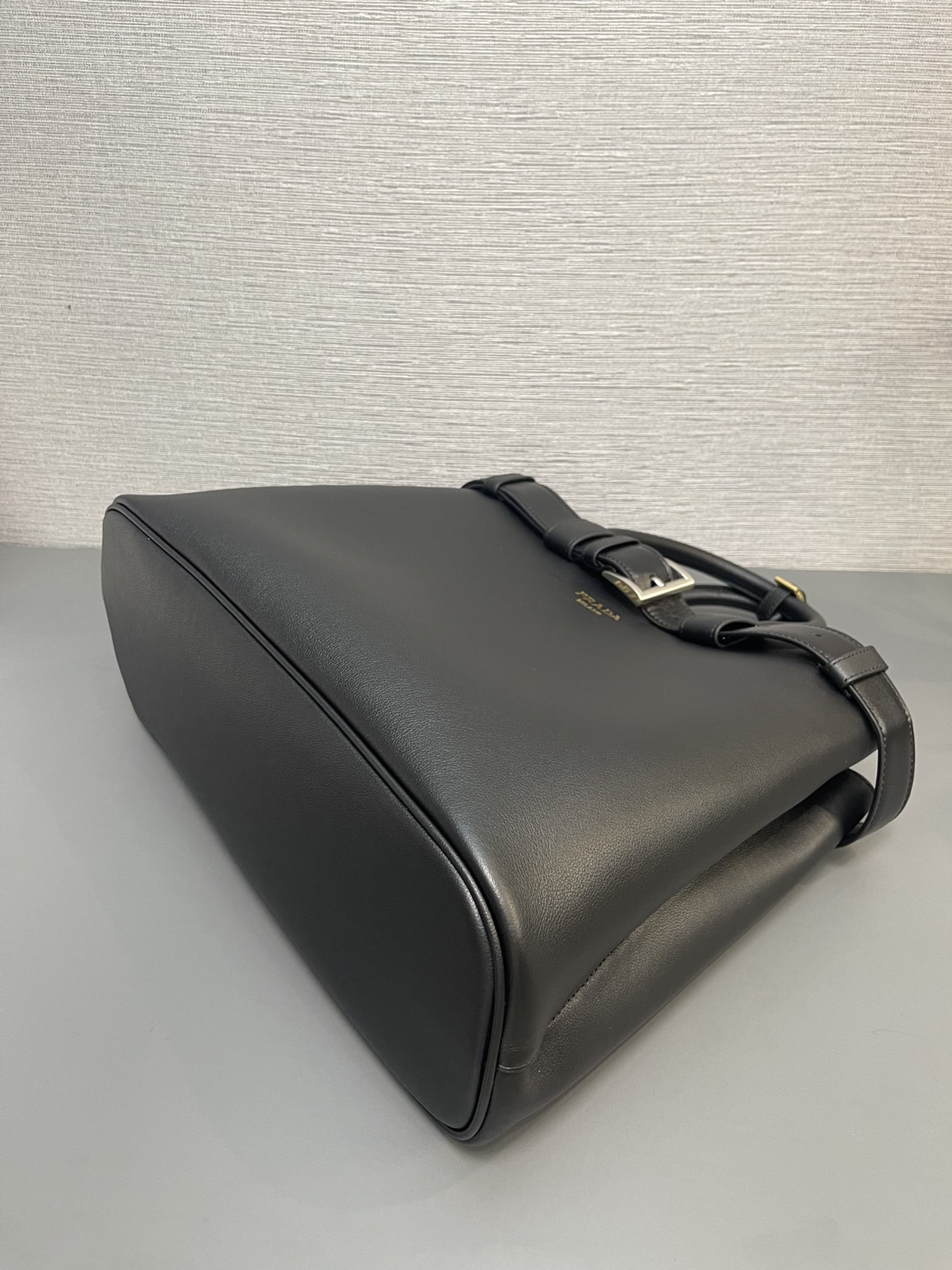 Pra*a buckle large leather handbag with belt