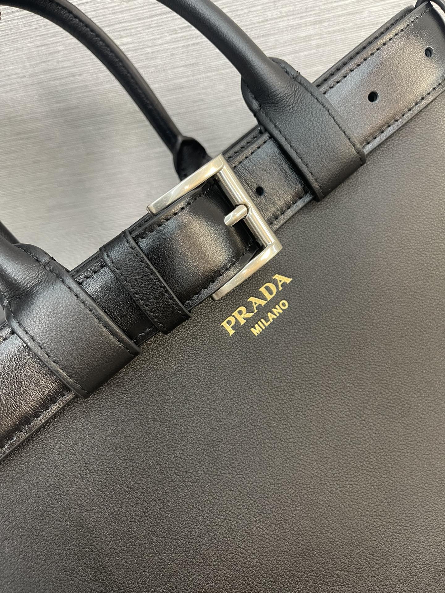Pra*a buckle large leather handbag with belt