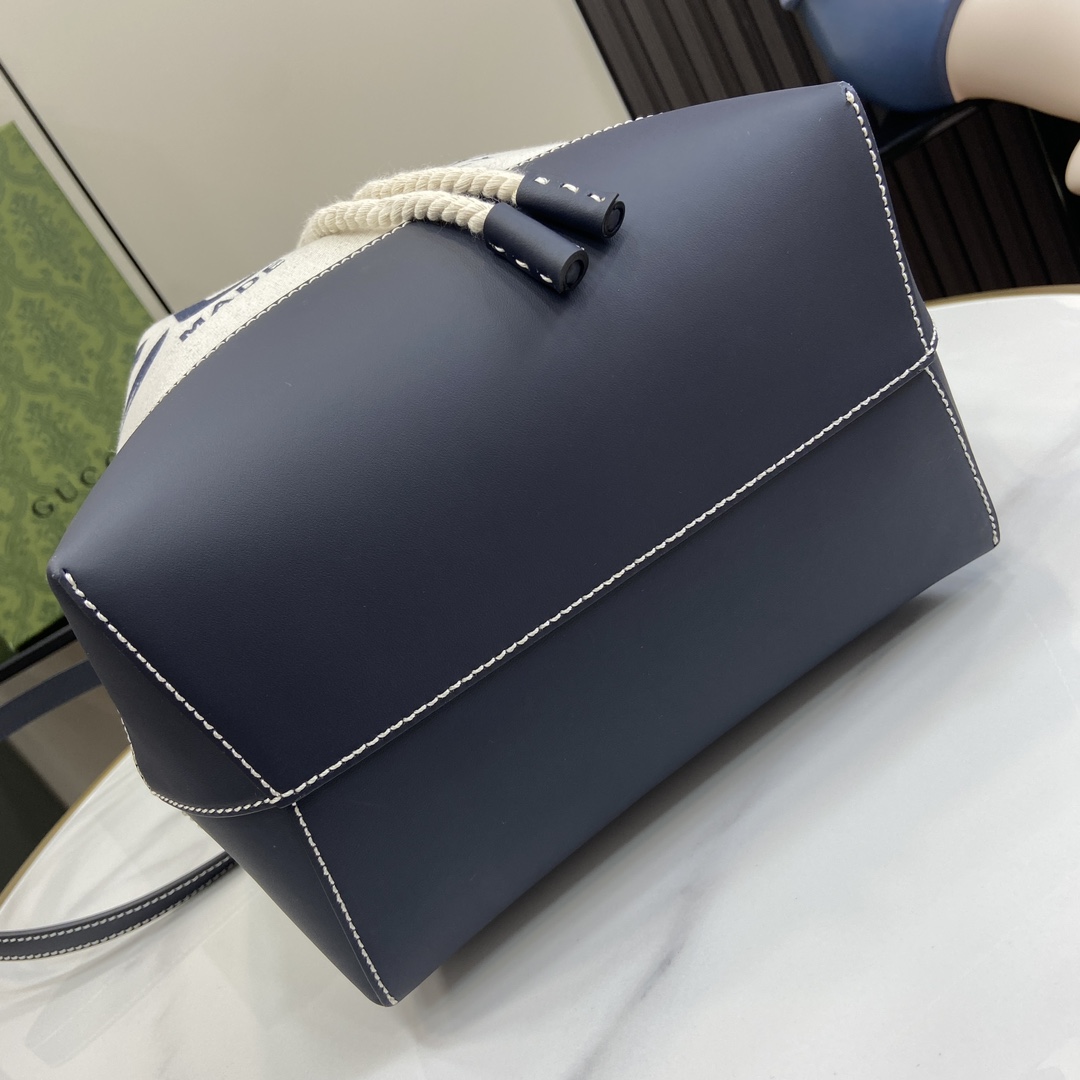 G*u*i small shoulder bag with G*u*i print