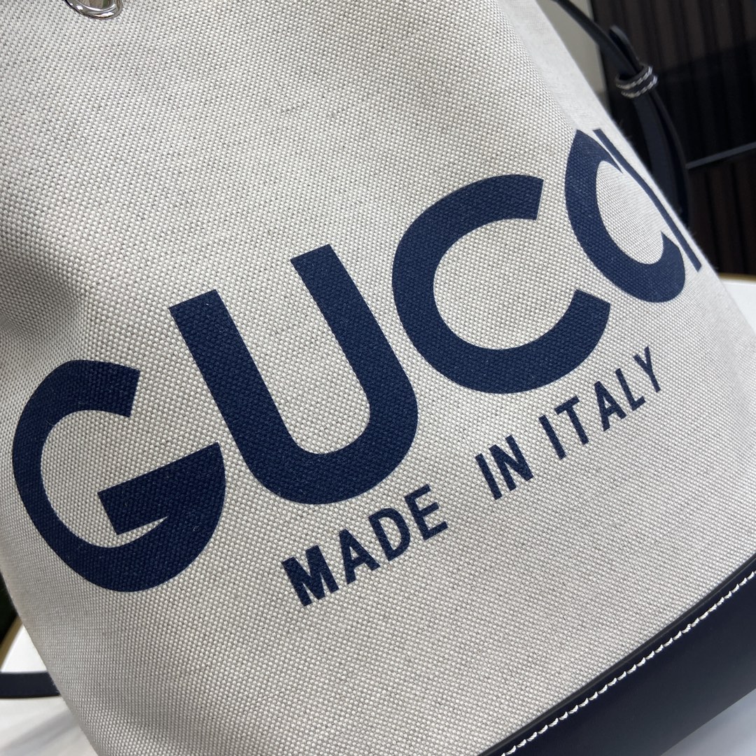 G*u*i small shoulder bag with G*u*i print