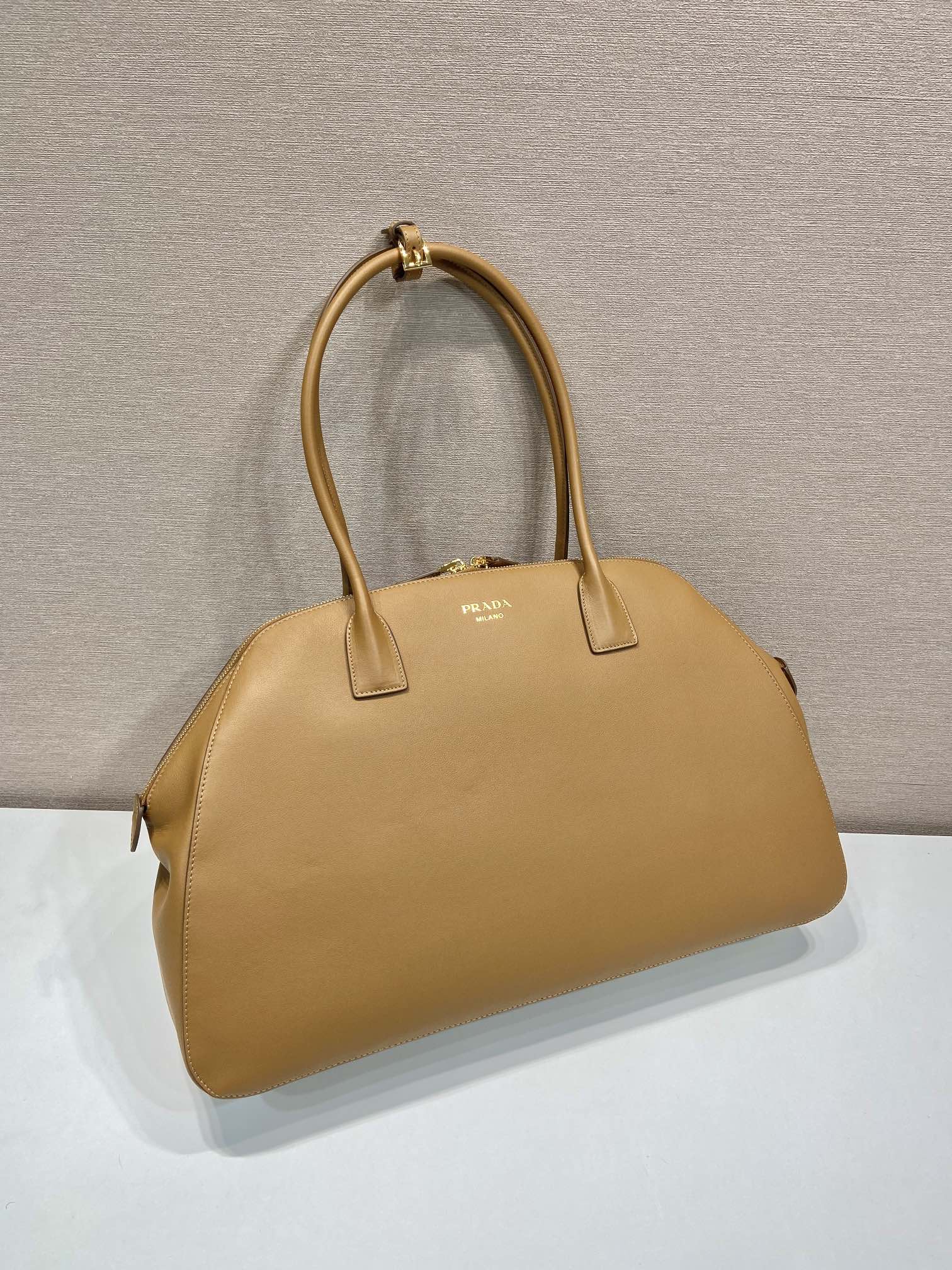 Large leather tote bag with zipper closure