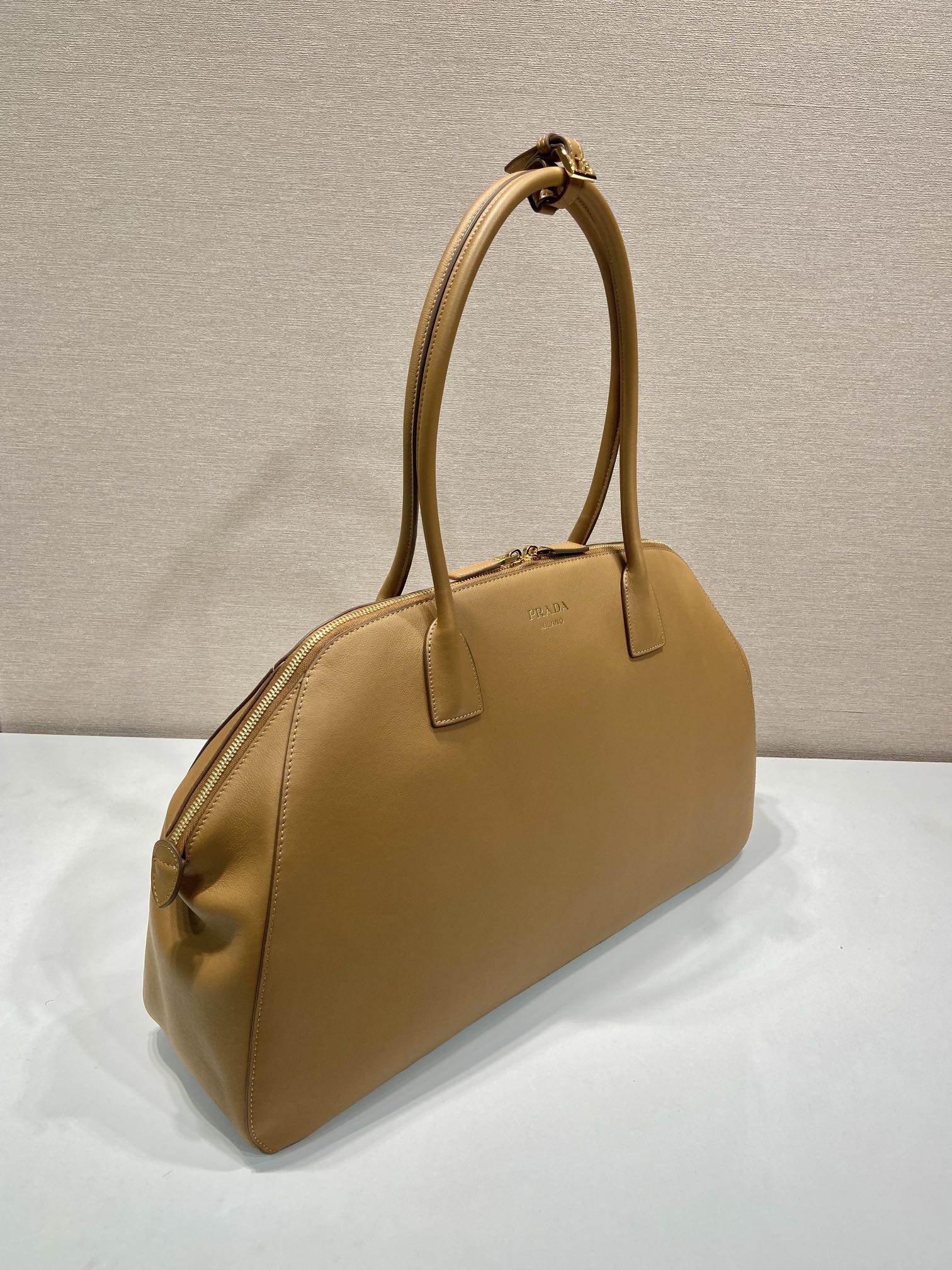 Large leather tote bag with zipper closure