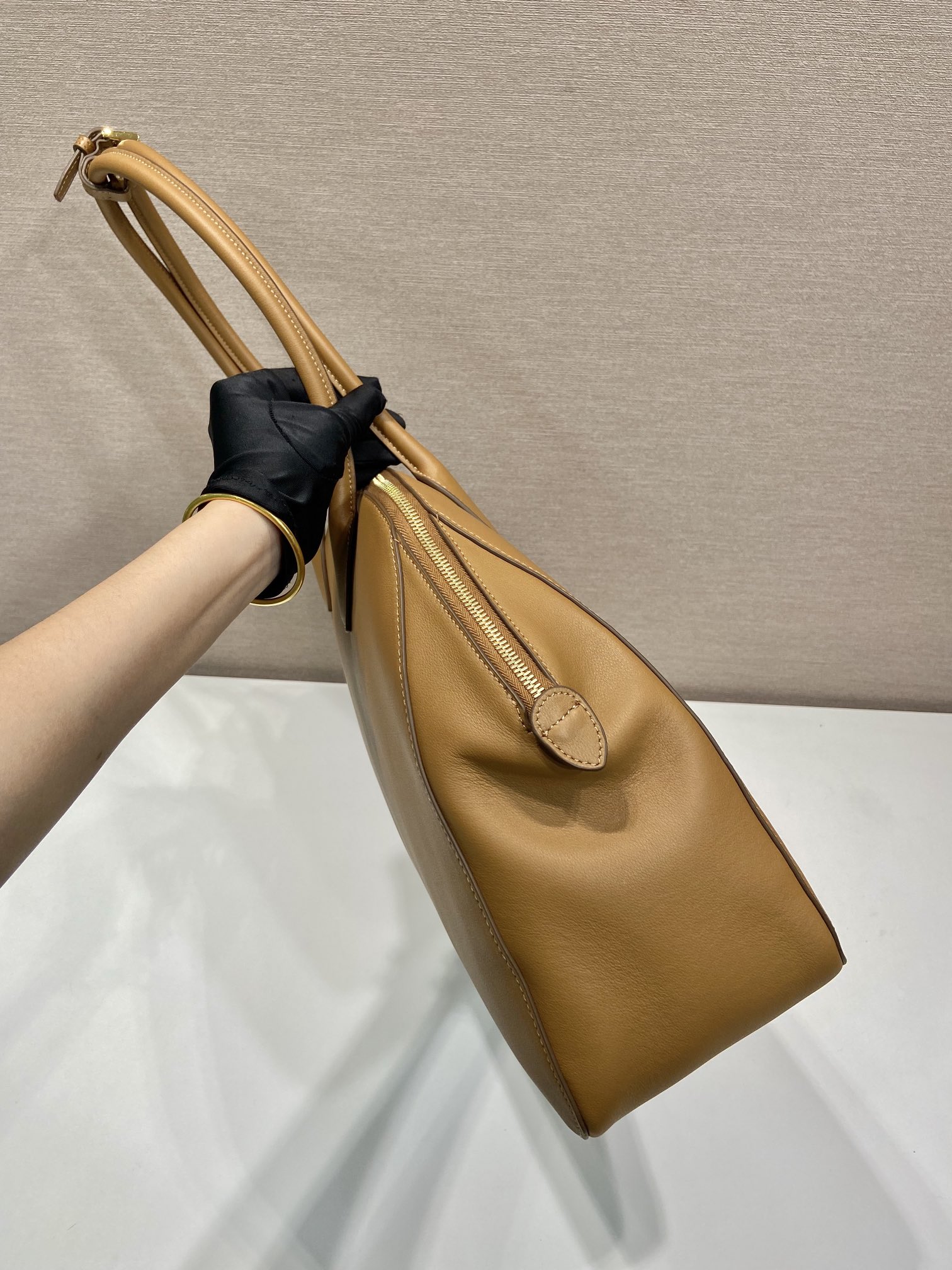 Large leather tote bag with zipper closure