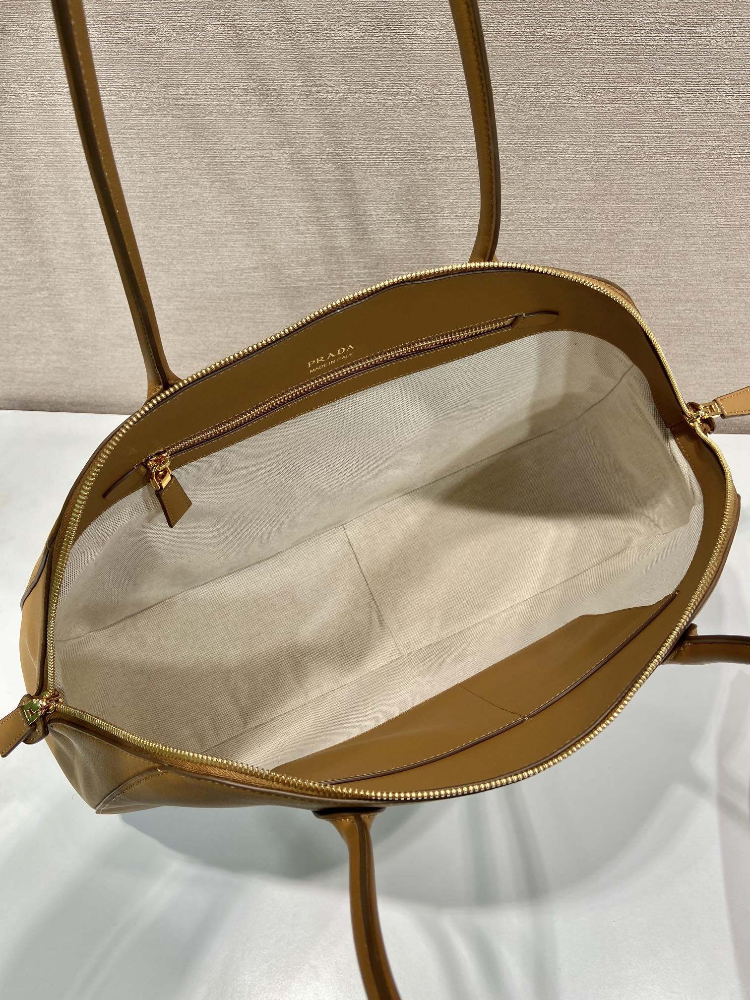 Large leather tote bag with zipper closure