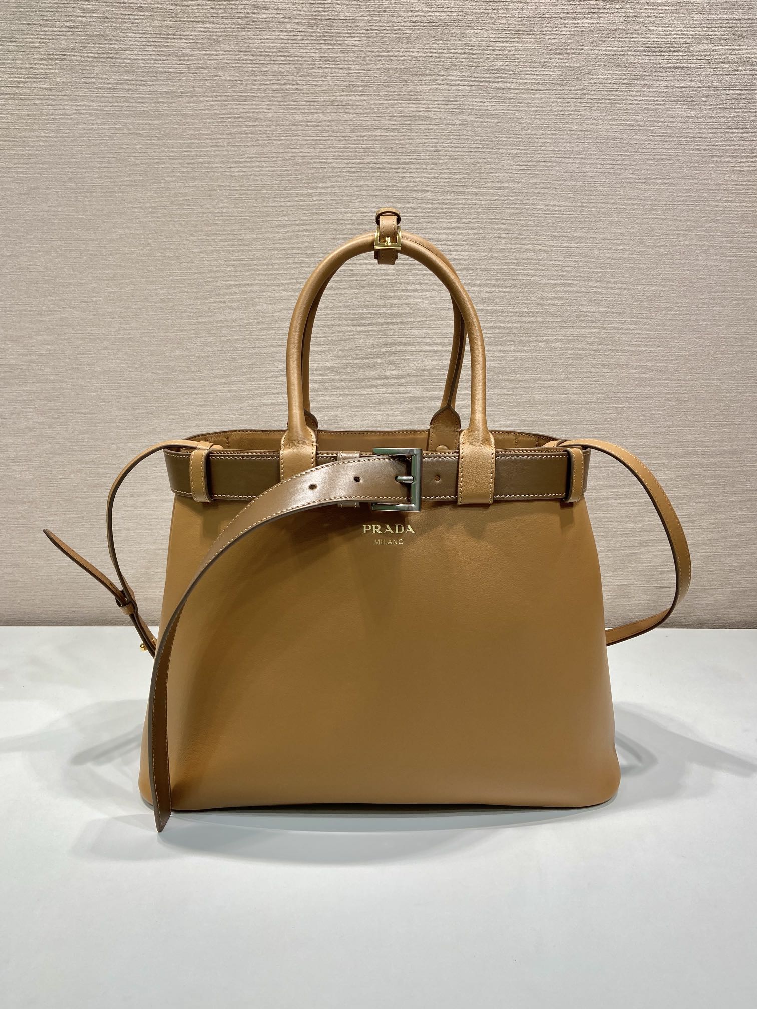 Pra*a buckle large leather handbag with belt