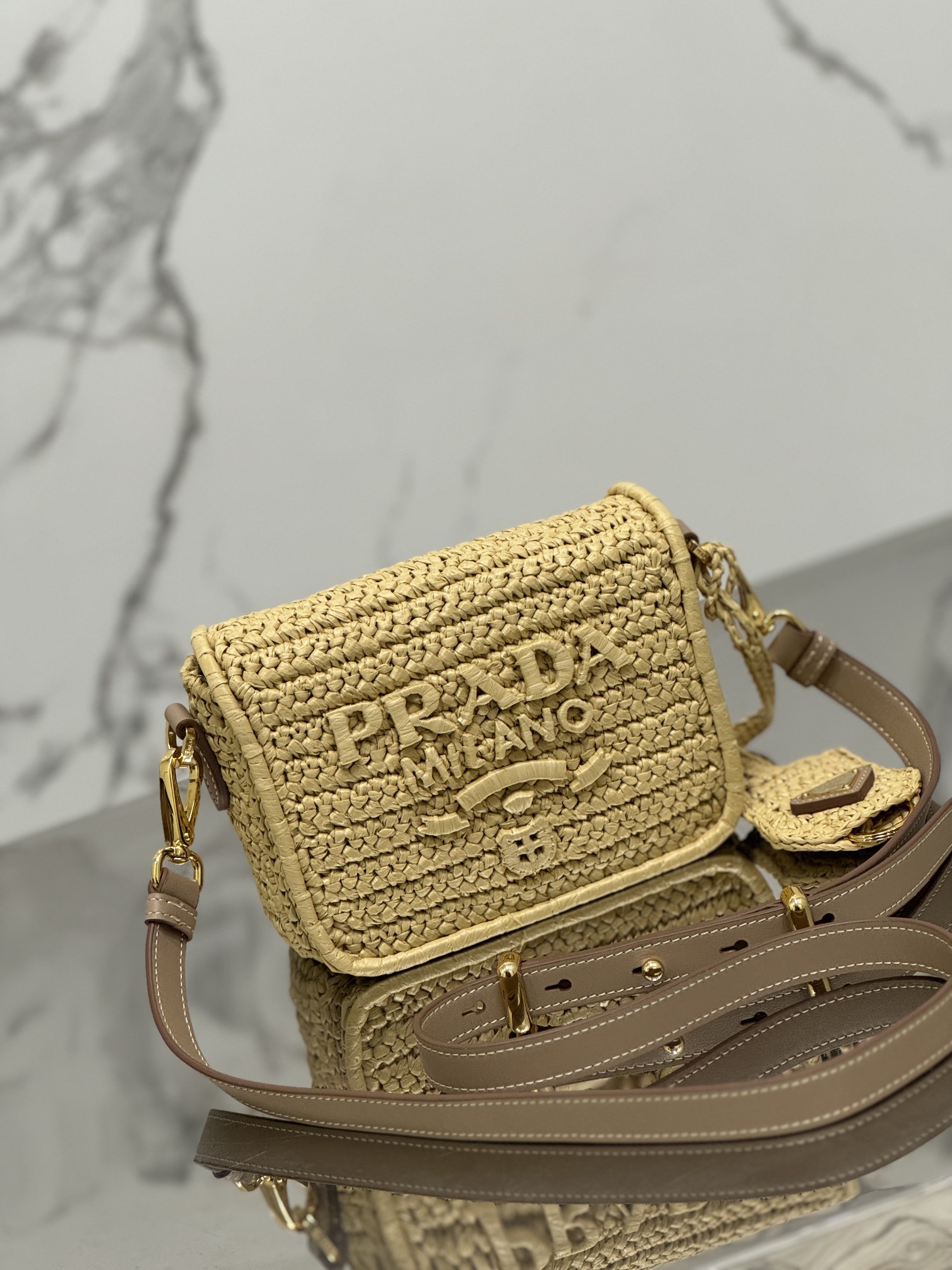 Pra*a crochet and leather shoulder bag with flap