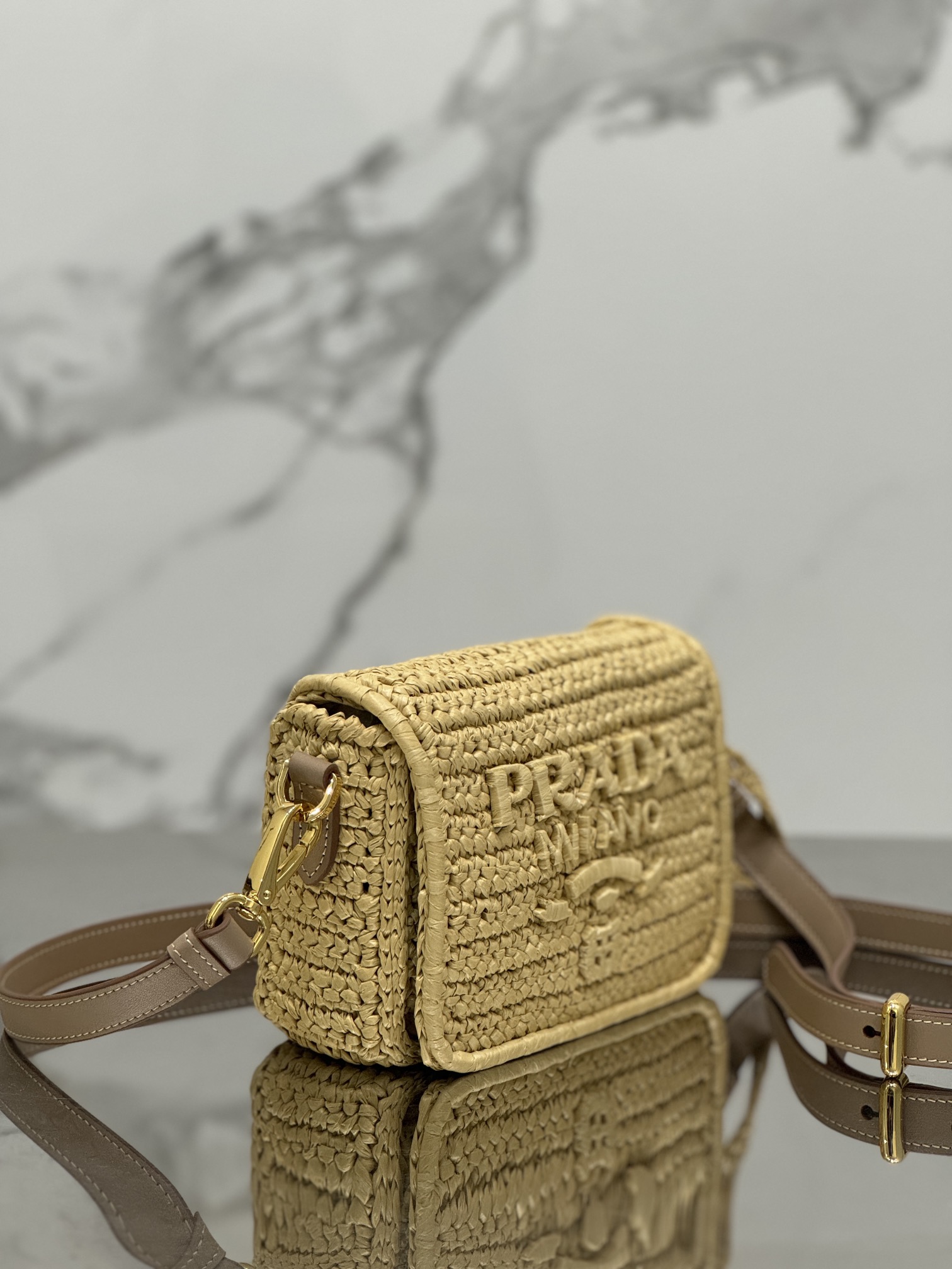 Pra*a crochet and leather shoulder bag with flap