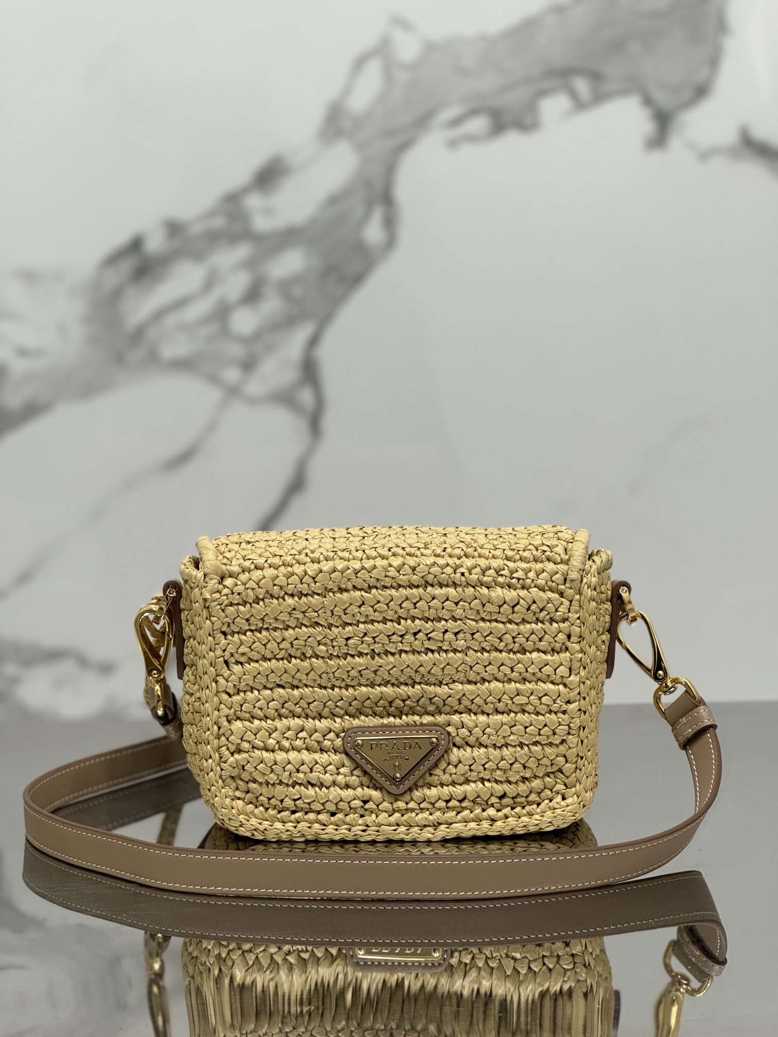 Pra*a crochet and leather shoulder bag with flap