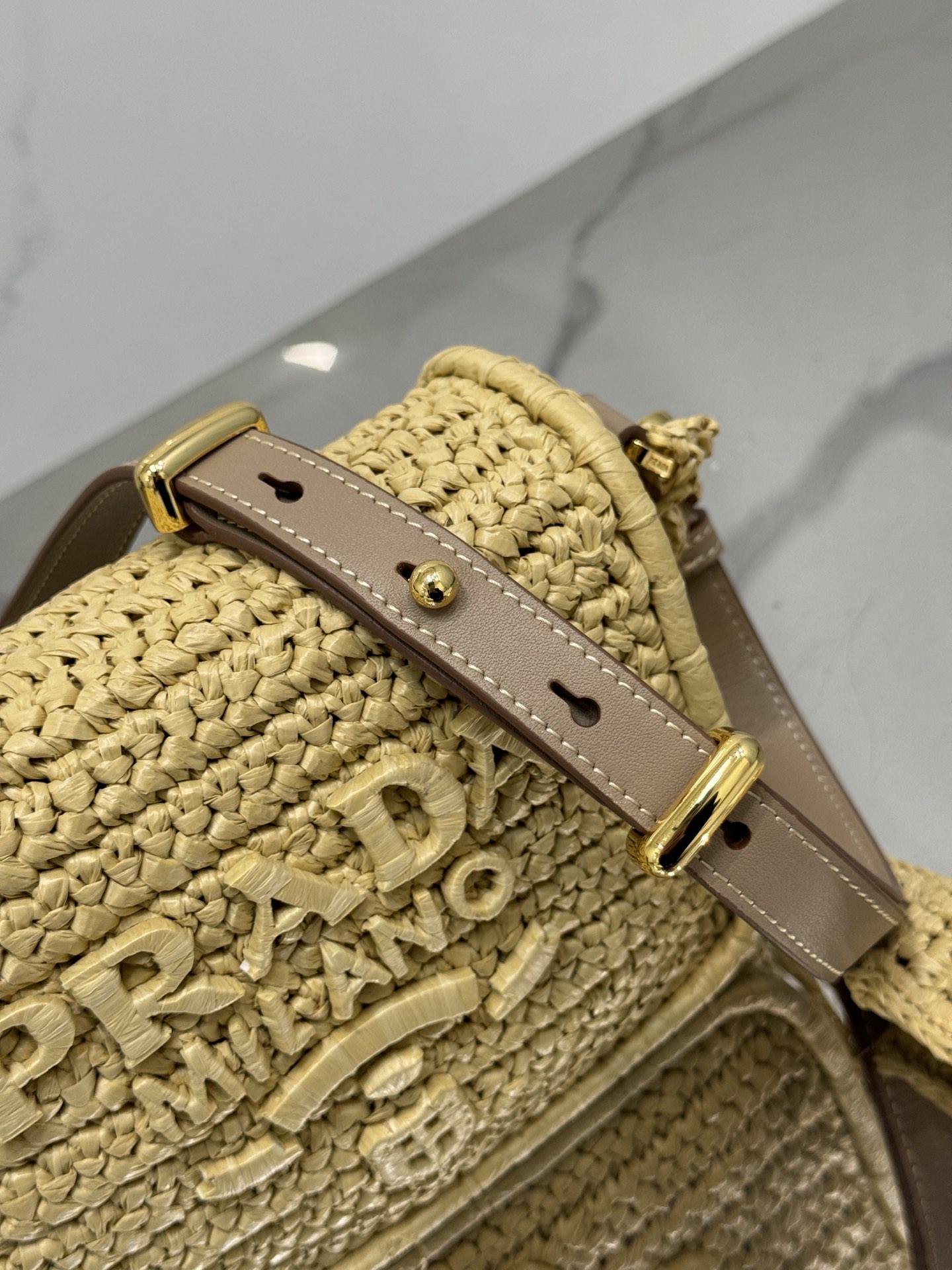 Pra*a crochet and leather shoulder bag with flap
