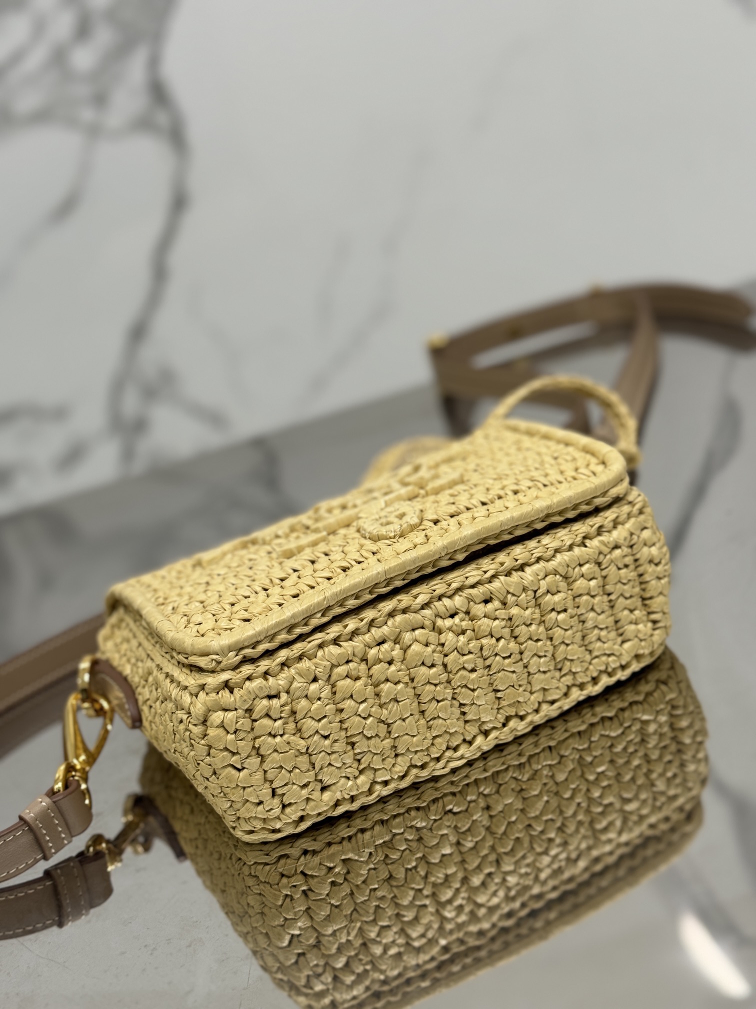 Pra*a crochet and leather shoulder bag with flap