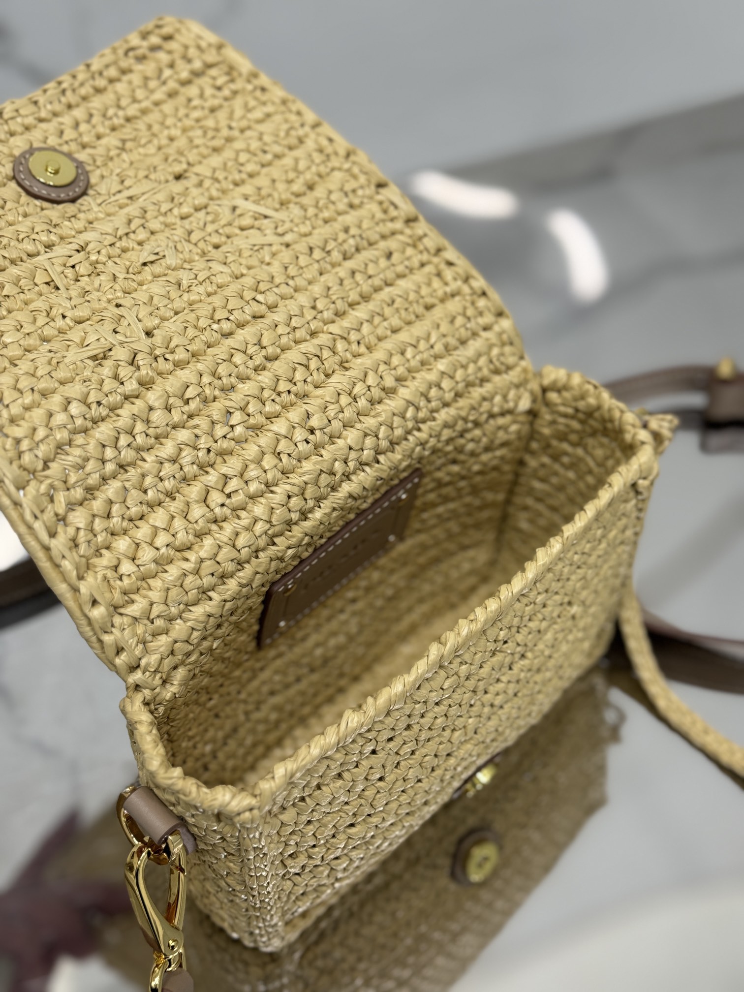 Pra*a crochet and leather shoulder bag with flap