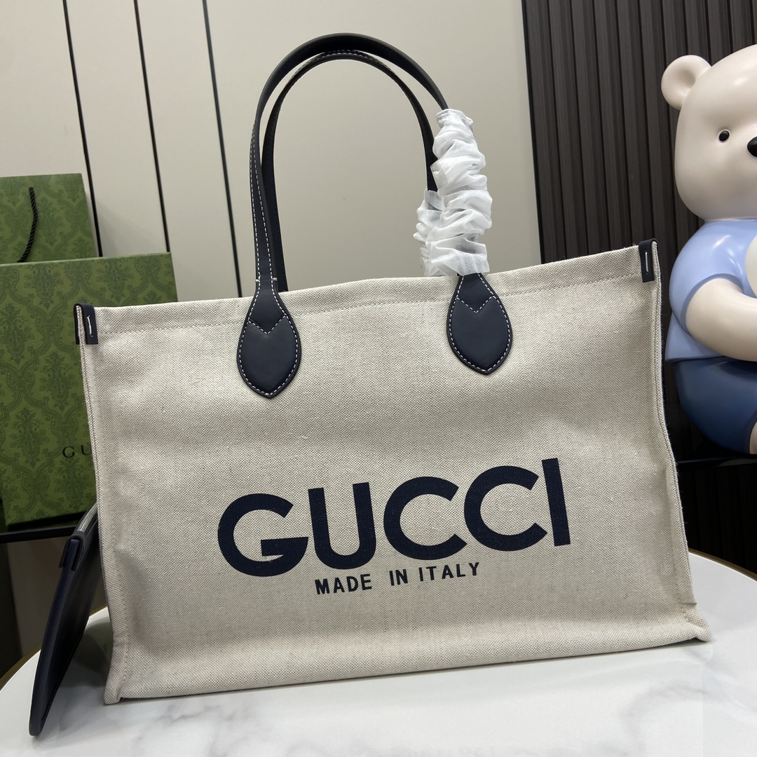 G*u*i medium tote bag with G*u*i print