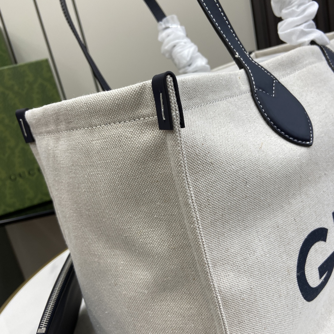 G*u*i medium tote bag with G*u*i print