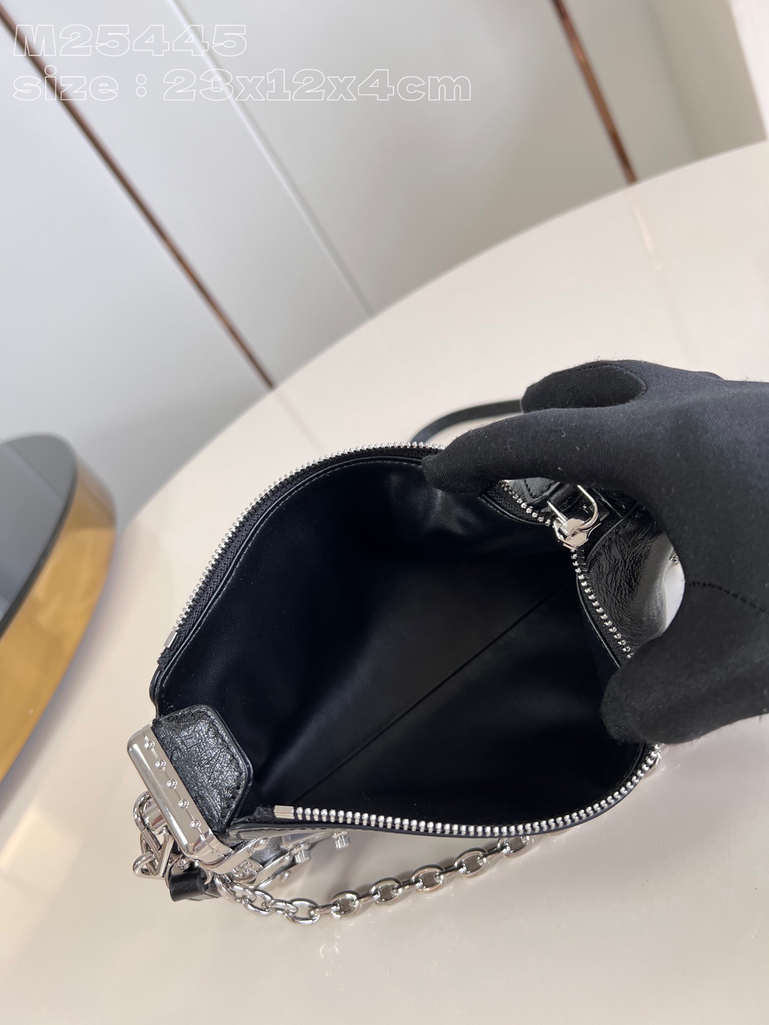 l**is V*t*n slim trunk handbag