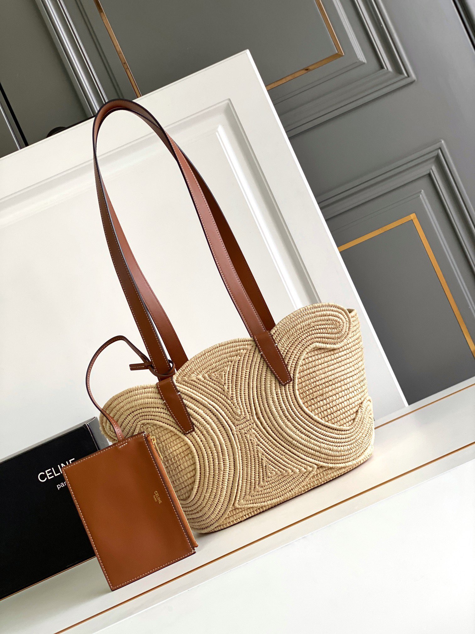 Ce**e Ce**e classic panier small braided triomphe in raffia and calfskin tan