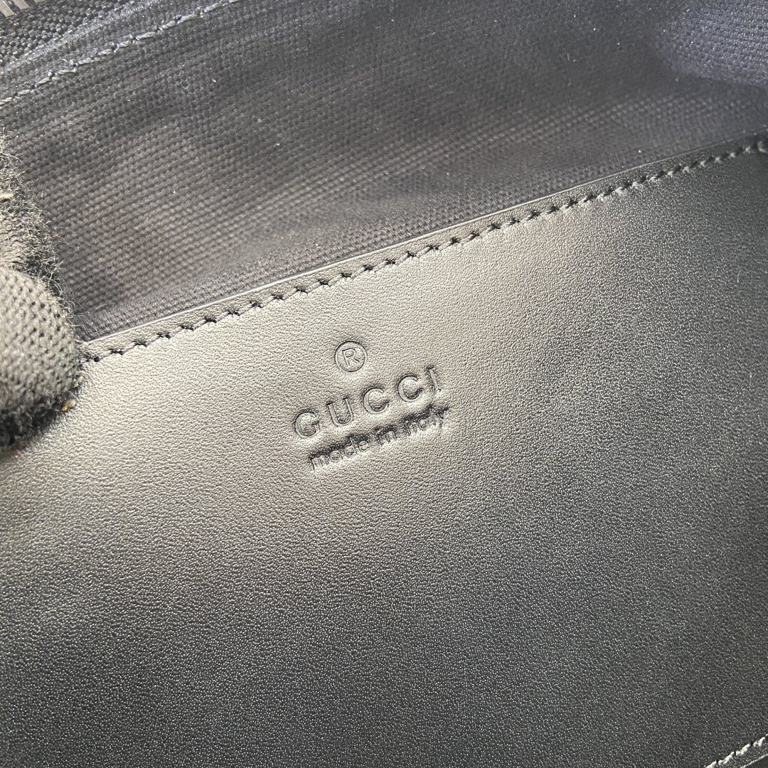 G*u*i gg cross-body bag