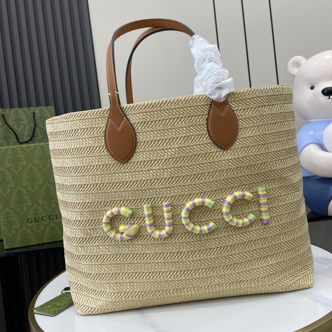 G*u*i medium straw-effect tote