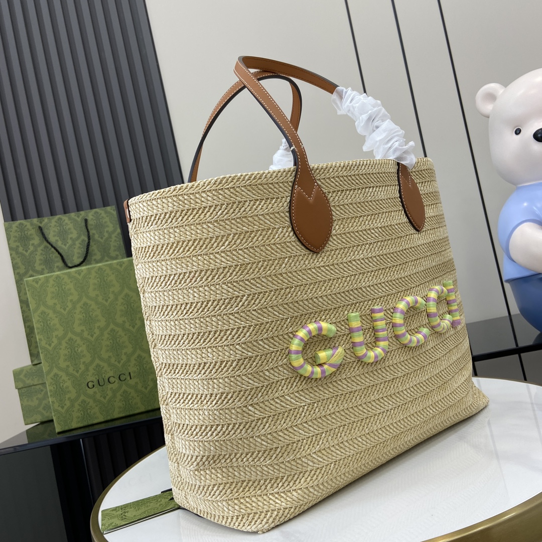 G*u*i medium straw-effect tote