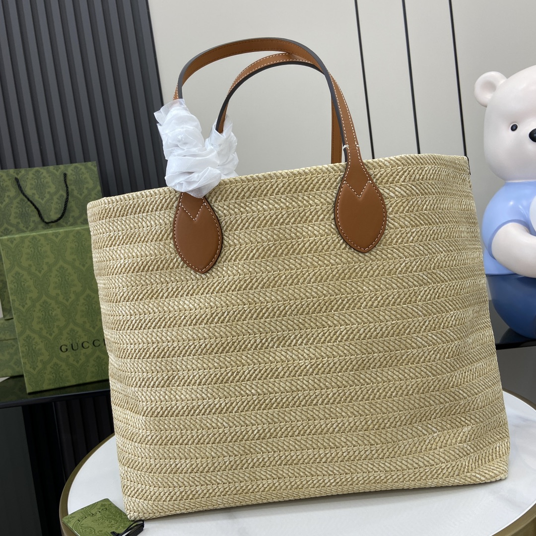 G*u*i medium straw-effect tote