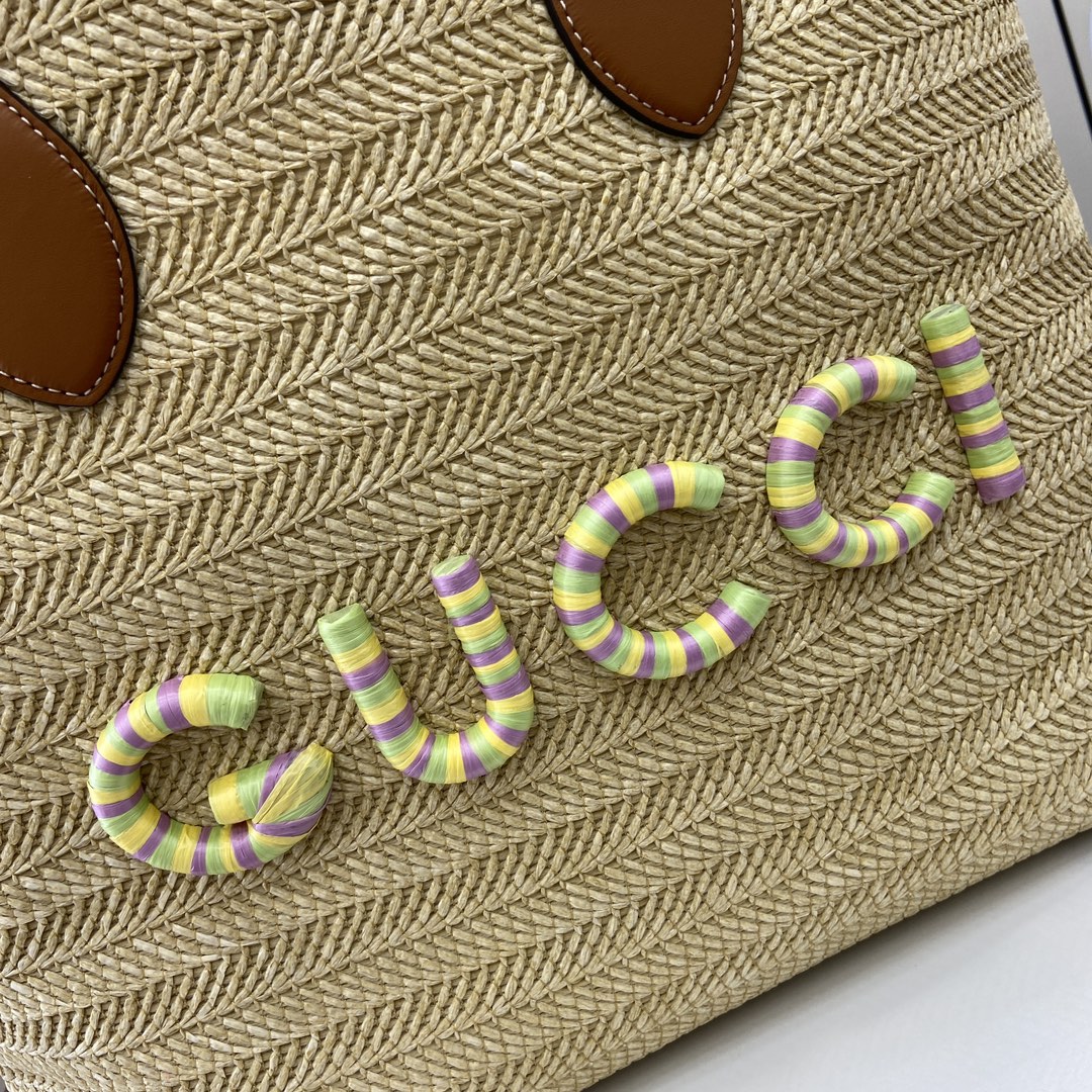 G*u*i medium straw-effect tote