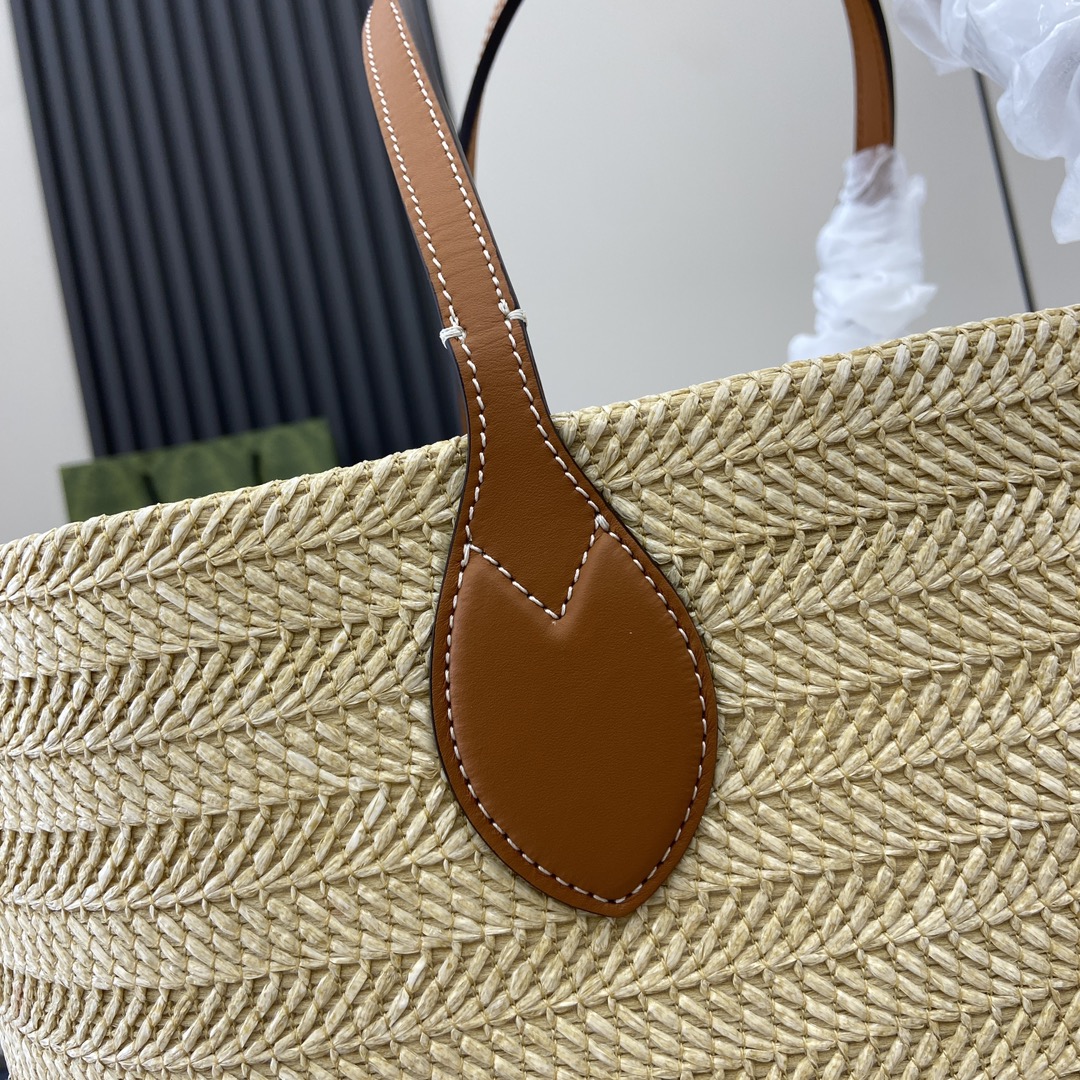G*u*i medium straw-effect tote