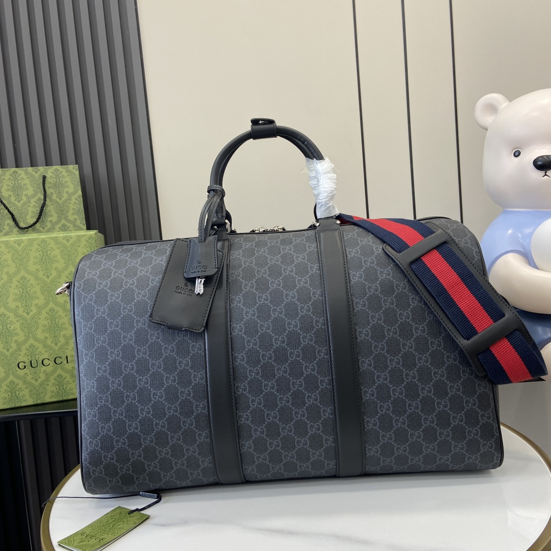 G*u*i gg duffle bag