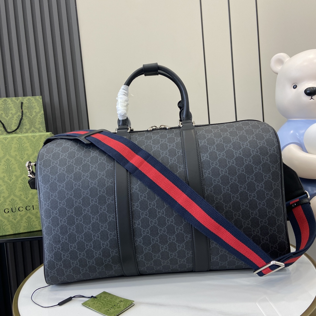 G*u*i gg duffle bag
