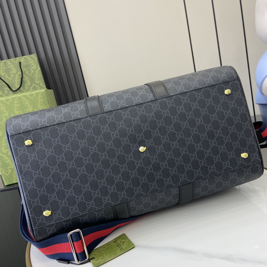 G*u*i gg duffle bag