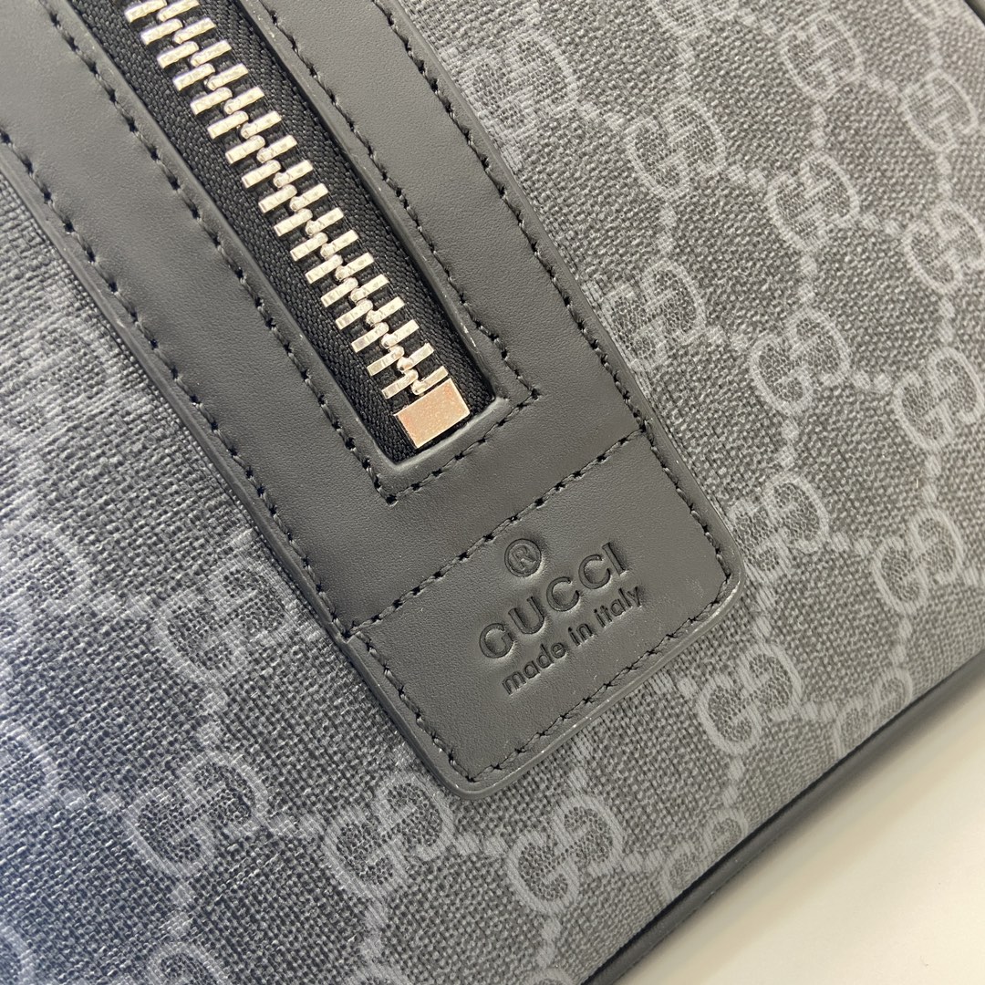 G*u*i gg duffle bag