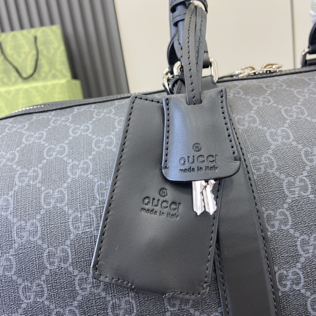G*u*i gg duffle bag