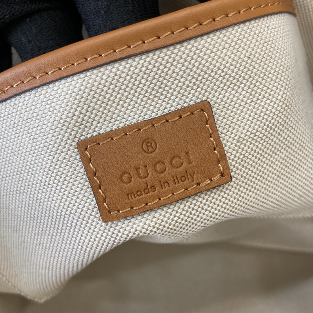 G*u*i small straw-effect tote