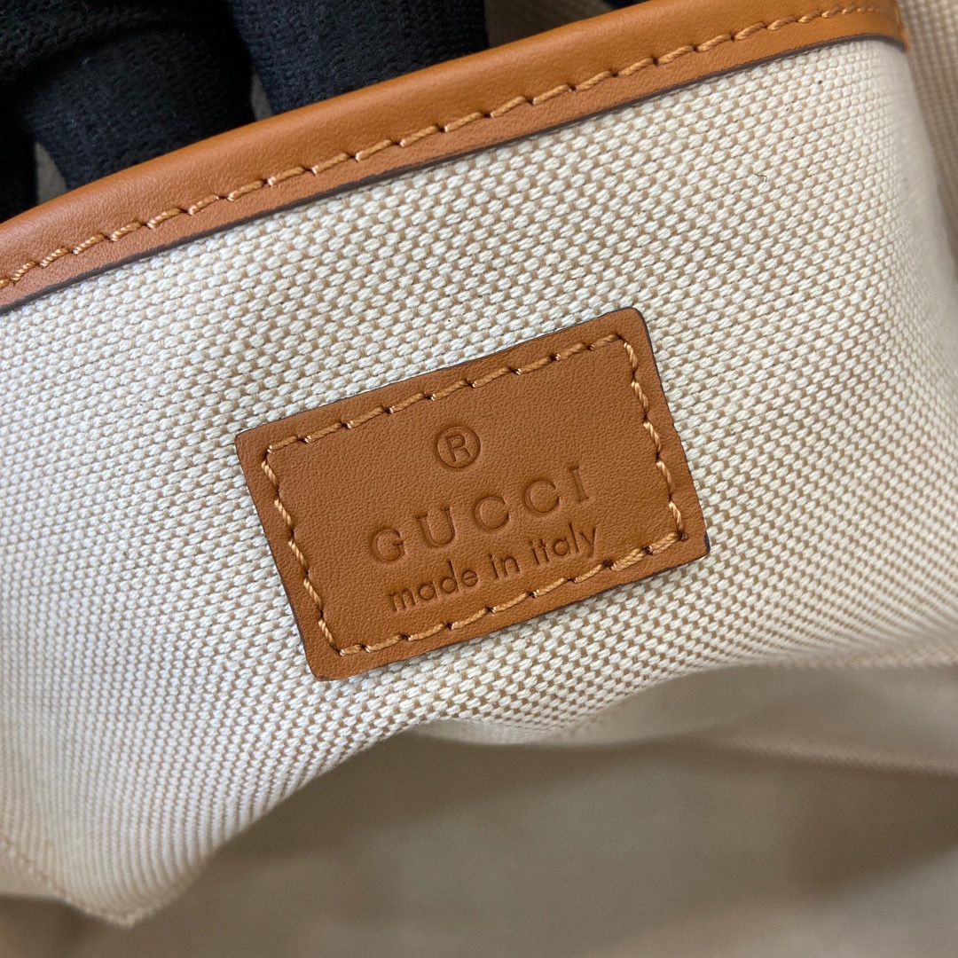 G*u*i small straw-effect tote