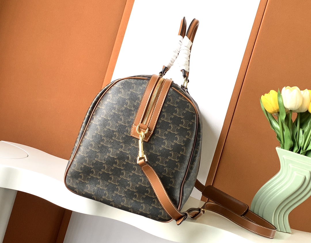 Ce**e large travel bag in triomphe canvas