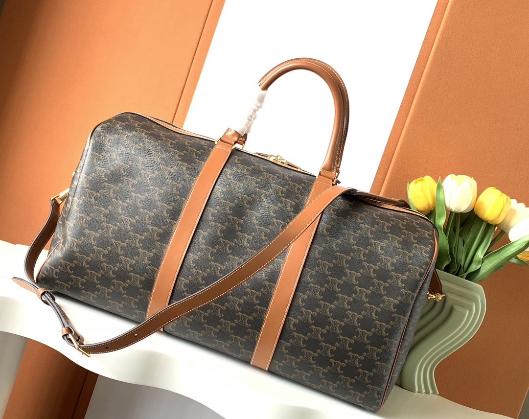 Ce**e large travel bag in triomphe canvas