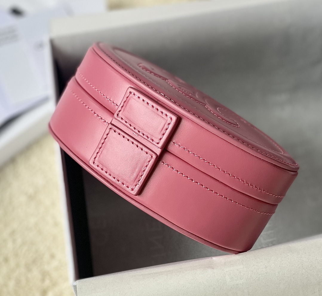 Ce**e oval minaudiere cuir triomphe